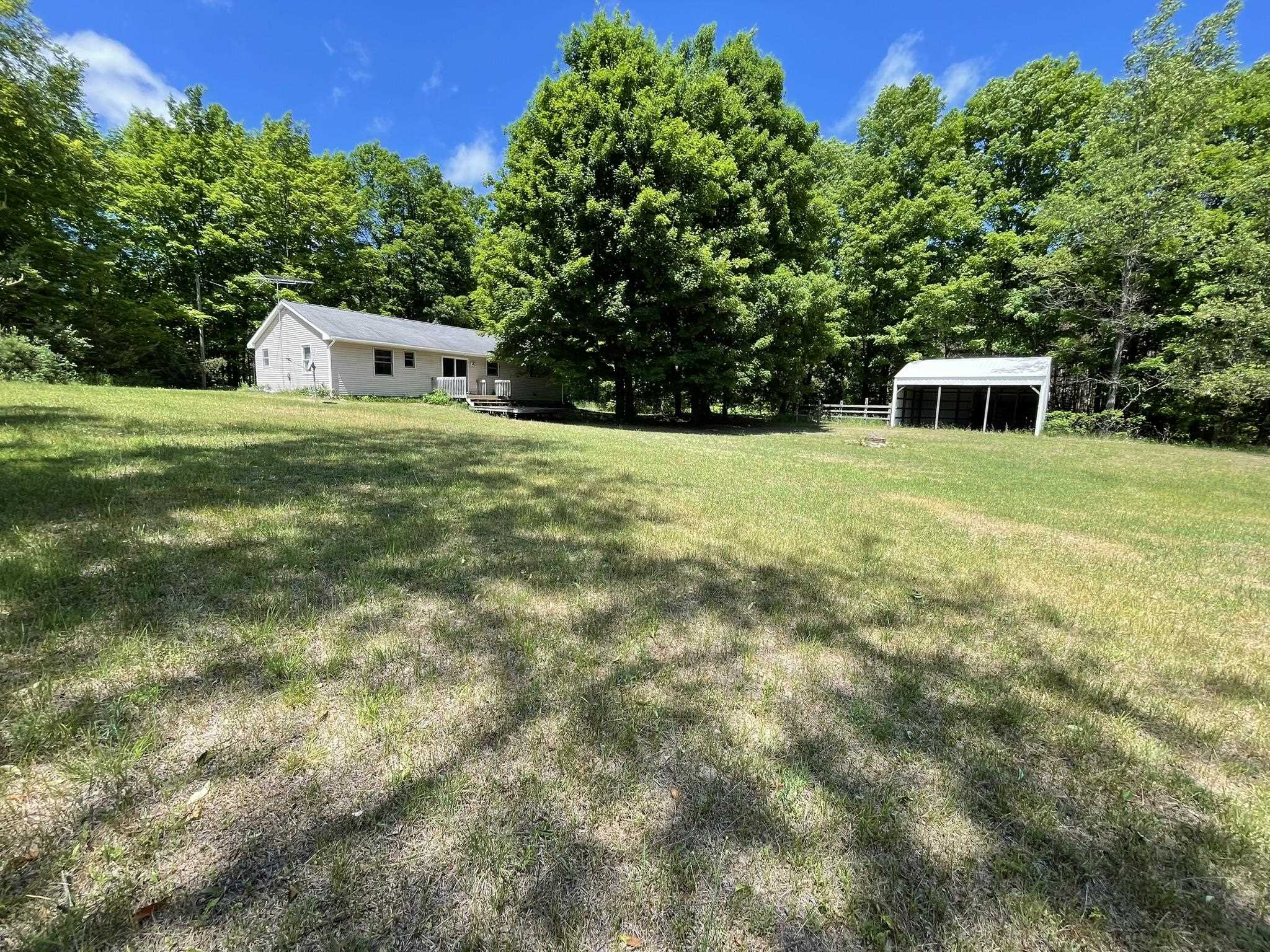 Photo 3 of Single family home for sale at 10511 Lake Of The Woods Rd, Mancelona, MI 49659 | MLS# 79080074072 | Listing updated on 2026-10-03
