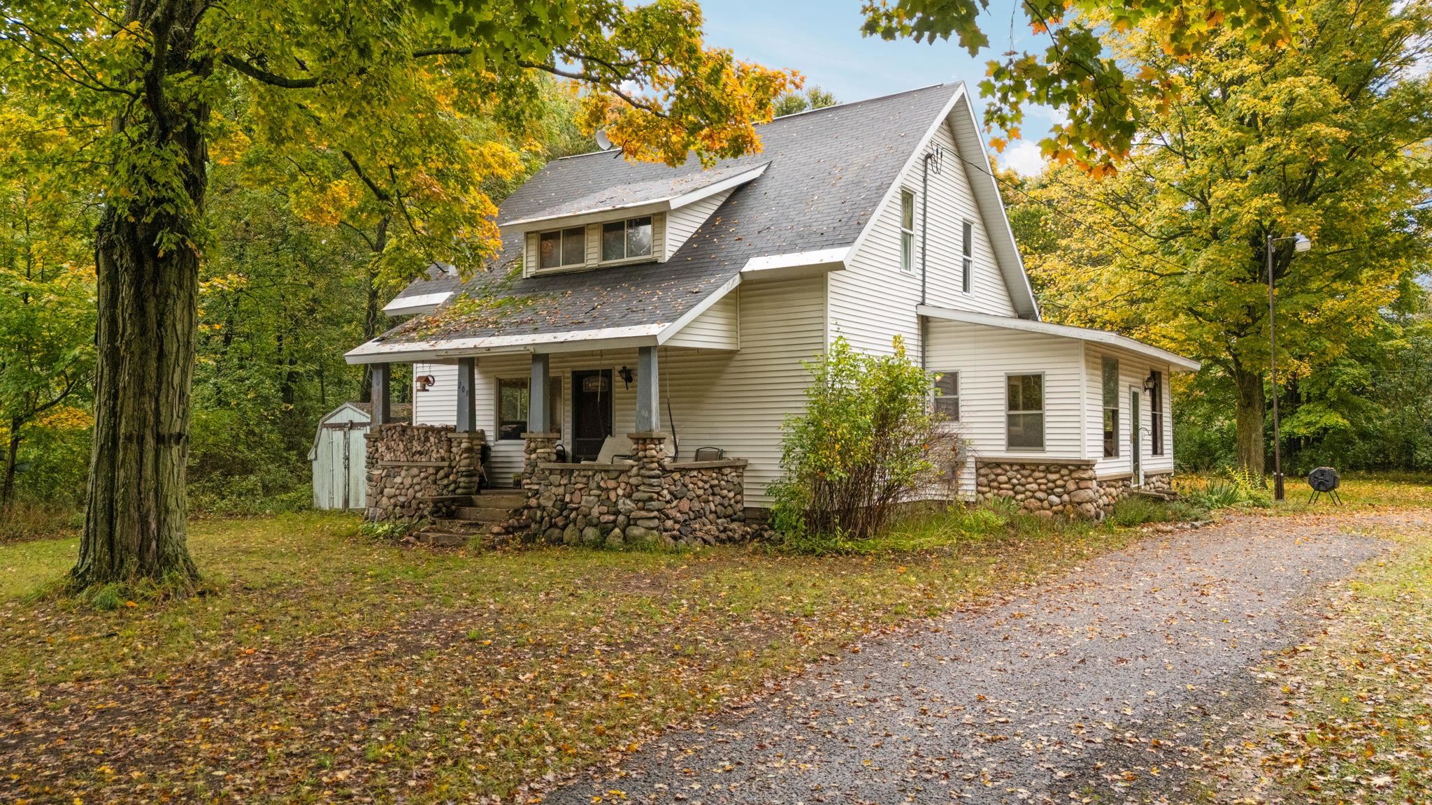 Photo 1 of Single family home for sale at 203 S Pioneer Rd, Beulah, MI 49617 | MLS# 78080074201 | Listing updated on 2026-10-06