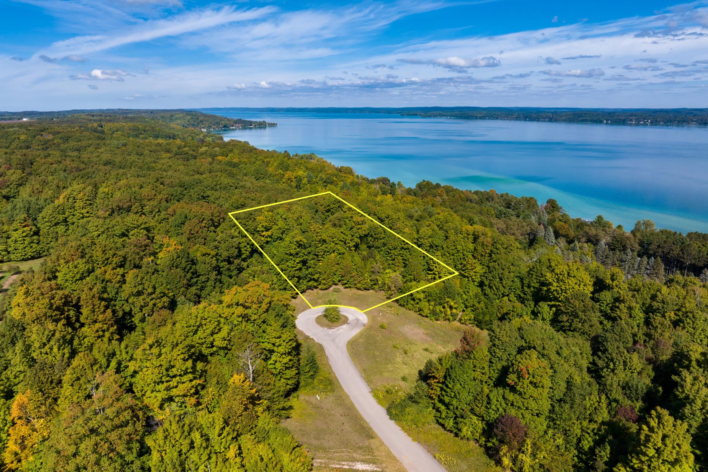 Photo 1 of Land for sale at Lot 8 Timber Valley Ct, Rapid City, MI 49676 | MLS# 78080074202 | Listing updated on 2026-10-06