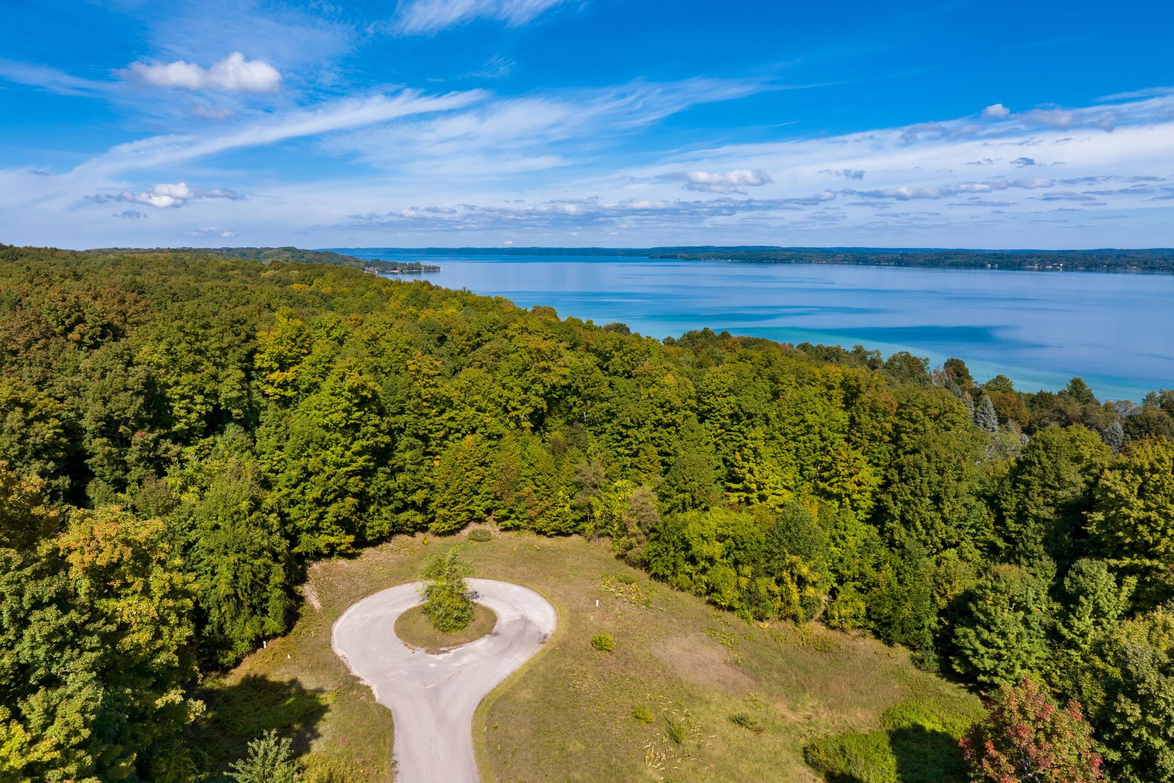 Photo 4 of Land for sale at Lot 8 Timber Valley Ct, Rapid City, MI 49676 | MLS# 78080074202 | Listing updated on 2026-10-06