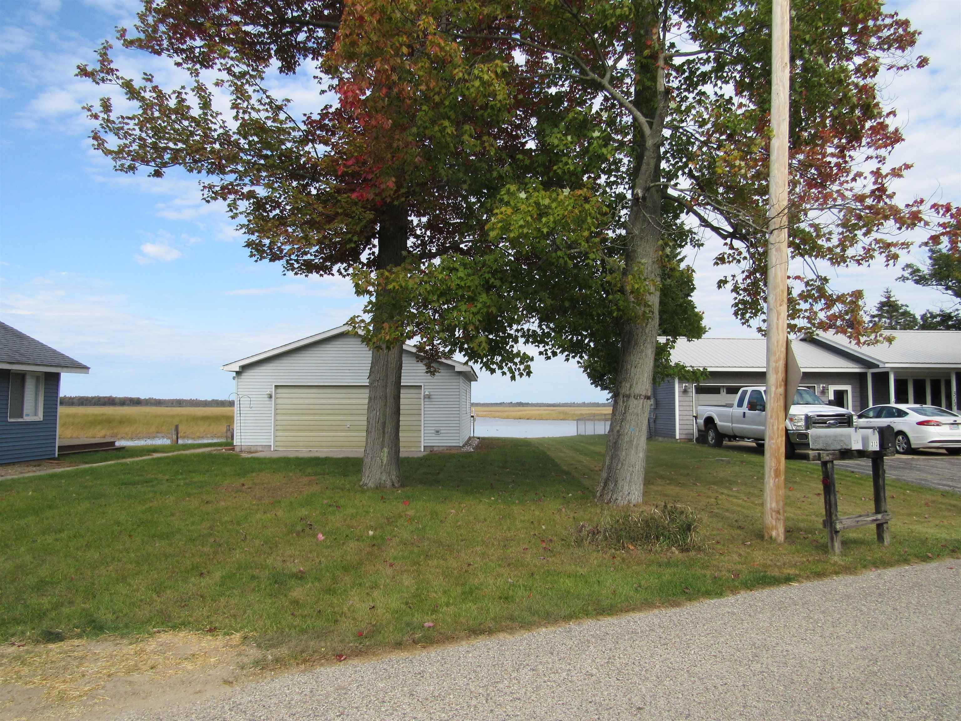 Photo 1 of Single family home for sale at 312 Lakewood Dr, East Tawas, MI 48730 | MLS# 77080074283 | Listing updated on 2026-10-07