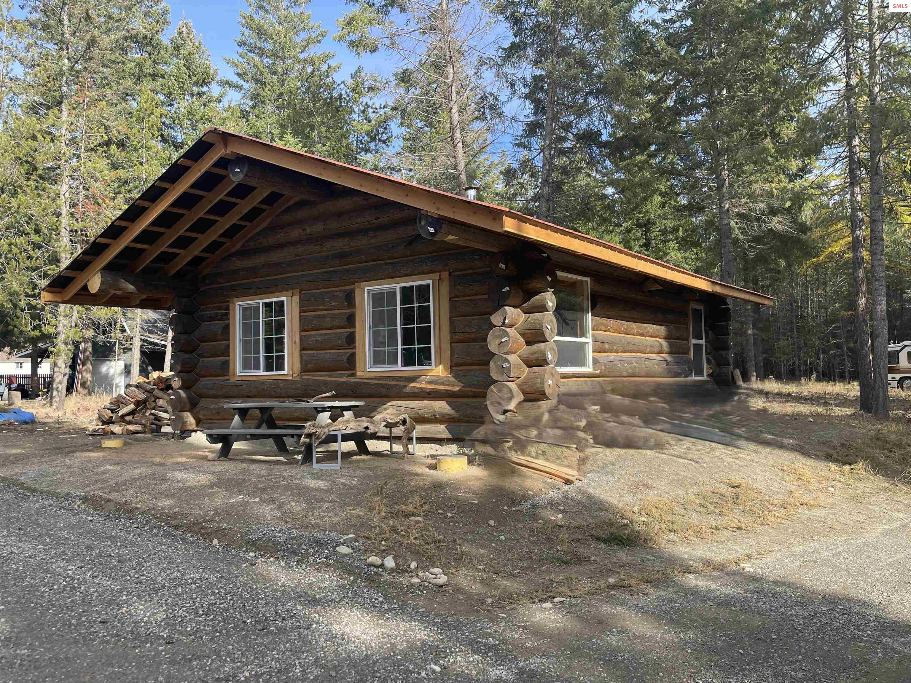Front exterior of 391 Champs Rd.