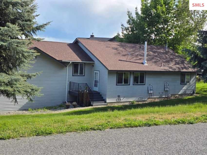 Front exterior of 6894 Wild Rose Lane