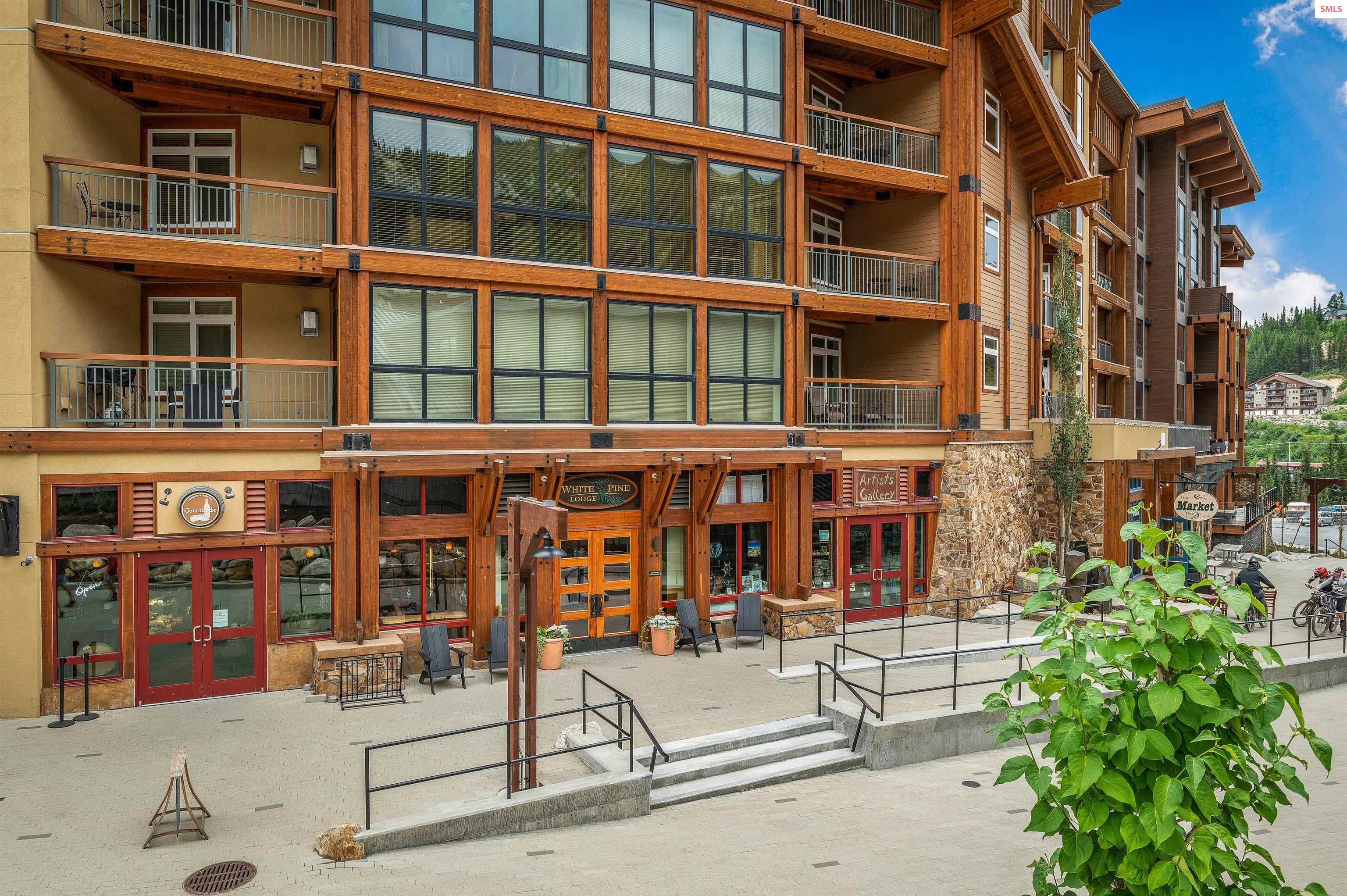 Front exterior of 124 Village Ln #203