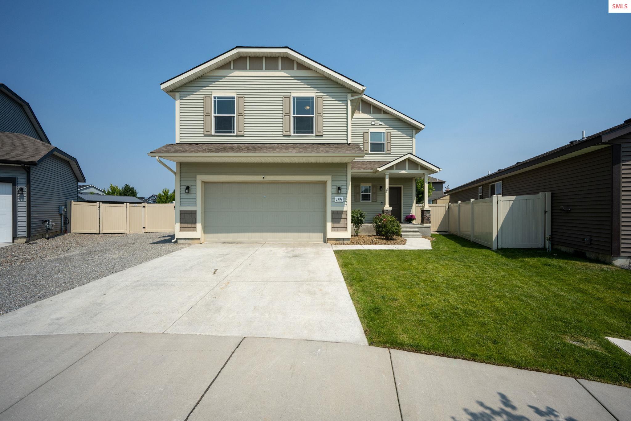 Front exterior of 1596 N Minam  Loop