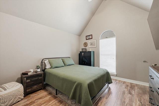 Upstairs bedroom with vaulted ceiling