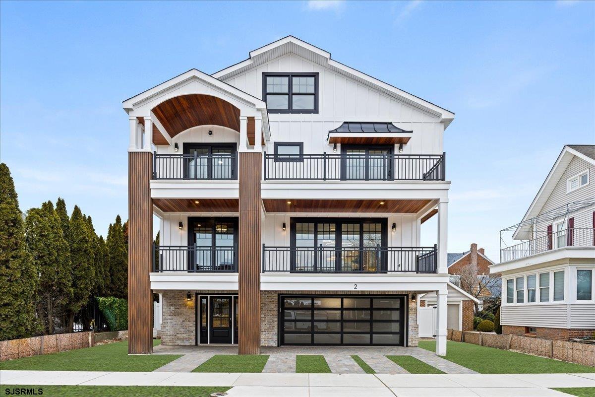 Welcome to coastal luxury redefined. This brand-new custom residence is nestled in the highly sought-after Parkway section of Margate, where elegance meets modern coastal living just moments from the beach. From the moment you arrive, you’ll be captivated by the sophisticated design and the unparalleled attention to detail throughout this three-level masterpiece.  Step into the grand foyer and ascend by elevator or staircase to the heart of the home—an open-concept main floor perfect for entertaining. The gourmet kitchen features a 48” Subzero, 48” Wolf, an oversized island, and a walk-in pantry, all seamlessly flowing into the dining area and a sun-drenched living room with a statement fireplace. A separate bar/game room and powder room round out this level, with spacious decks for summer BBQs and parties. The private backyard oasis is complete with an extra large 11x28' pool that comes with a sundeck and optional Jacuzzi.  The second level offer four generously sized bedrooms, including a pair of beautifully appointed guest suites sharing a designer bathroom. Each room is accentuated by custom finishes, generous closet space, and charming window seats. The primary suite promises to be a serene retreat with spa-inspired en-suite amenities and an impressive walk-in closet. On the third level you will find two additional guest bedrooms complete with an adjoining bathroom.  Outdoors, indulge in the ultimate relaxation or host unforgettable gatherings on the expansive yard featuring a luxurious full-size pool—a rare gem in the area. Whether you're lounging poolside or enjoying al fresco dining under the stars, this outdoor space is designed for both tranquility and celebration.  Located just a short stroll from Margate’s pristine beaches, boutique shopping, and top-tier dining, this residence offers the perfect blend of beach-town charm and refined luxury.