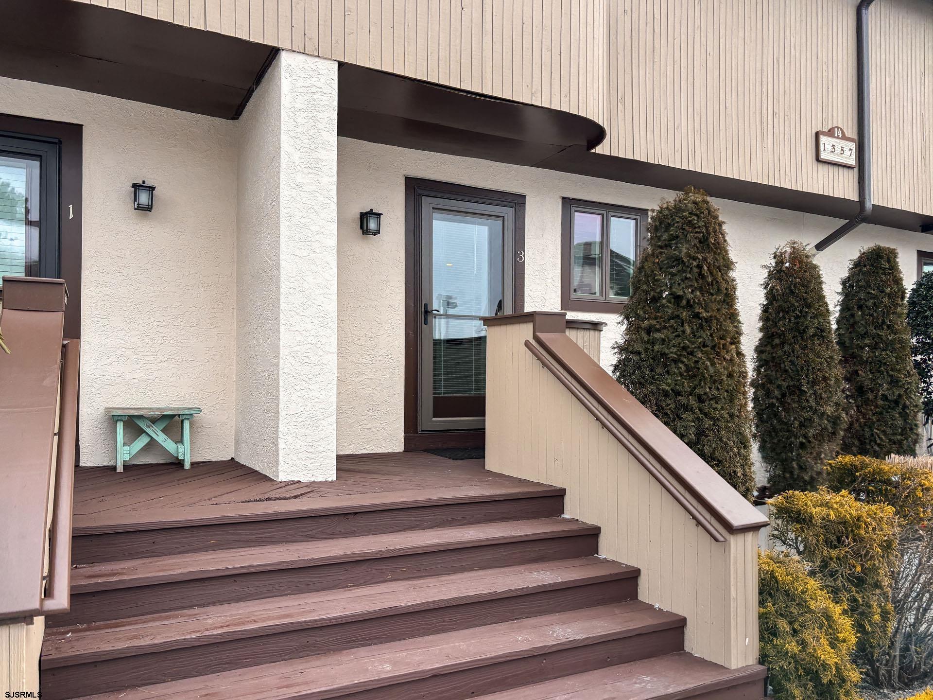 Welcome to your own coastal retreat at Ocean Reef. This beautifully maintained townhome invites you to relax the moment you step inside, with an updated kitchen that opens to the dining and living areas and a cozy fireplace perfect for quiet evenings or gathering with friends. Step outside through the Anderson sliding doors and enjoy the deck that leads to thoughtfully designed hardscaping featuring a brand new Weber natural gas grill – ideal for summer nights, weekend entertaining or simply unwinding after the day at the beach.  Upstairs an oversized bedroom offers flexibility to create a second bedroom or private office, a layout many owners have already embraced.  A full-size washer and dryer just off the bedroom add everyday convenience.  Start your mornings on the sunny private upstairs deck and end your days in a peaceful space designed for comfort and ease. With major updates already completed – including fully renovated kitchen (2022), new heating and air conditioning (2022), water heater (2022), entry door (2024) and kitchen window (2024) – this home is truly move-in ready and waiting for you to make it your own. Ocean Reef is a beautiful bayfront community offering exceptional amenities, including two swimming pools - one heated - tennis and pickleball courts, a clubhouse and on-site professional property management. In addition, your two assigned parking spaces are just steps from your front door.