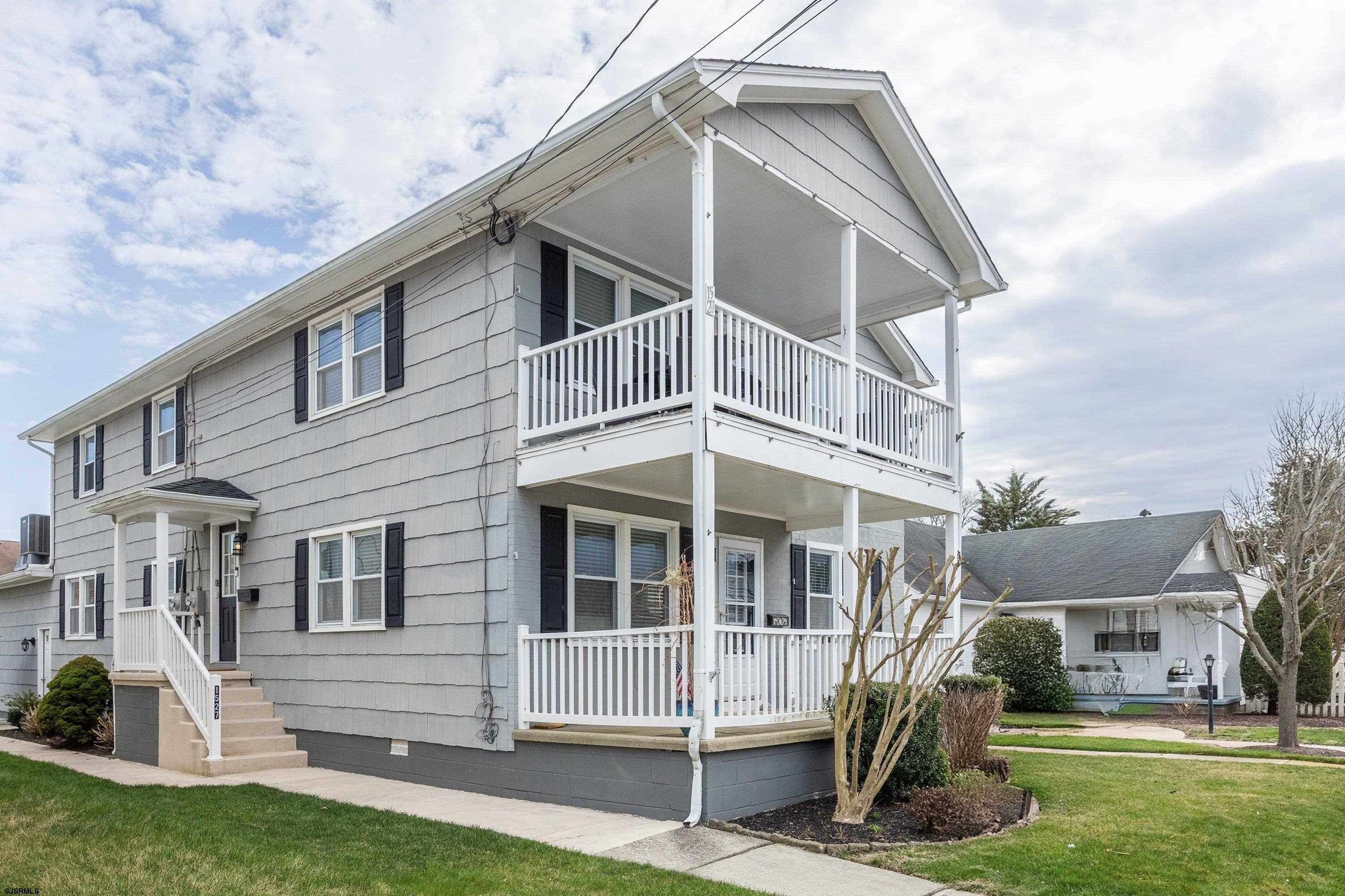 Welcome to your peaceful coastal retreat in Ocean City, where comfort meets convenience in a sunlit, second-floor condo designed for relaxation and easy living. Step into this newly updated 3-bedroom, 2-bath getaway and feel instantly at home. The spacious layout features larger-than-average rooms with cathedral ceilings that create an airy, open feel. Whether you’re gathering in the inviting main room under the vaulted ceiling or retreating to your bedroom for quiet time, there's space for everyone. Start your morning with coffee on the covered front porch, shaded by charming awnings, and end your evening there too — savoring dinner al fresco as the golden glow of the setting sun filters through. Bamboo hardwood flooring throughout adds a warm, stylish touch, while modern comforts like central AC and a new washer/dryer make for easy living. The location is unbeatable — tucked just far enough from the bustle of town to enjoy peace and quiet, yet close enough for a quick stroll to local favorites like Wawa, CVS, bakeries, and restaurants. Kids and adults alike will love the nearby playgrounds, basketball courts, tennis and pickleball, mini golf, and the Civic Center with library. Cast a line in the bay just a block away or enjoy a leisurely 6-block walk to the beach for a perfect shore day. Book your appointment before it's too late!