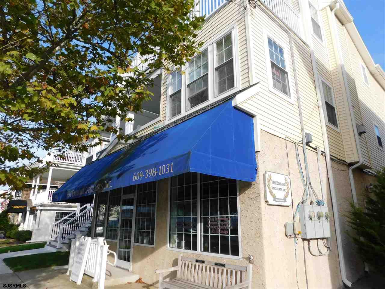 Come check out this Asbury Ave 4 bedroom, 2 bath second floor unit "BEST BUY" in OCNJ! This 1,500-square-foot condo offers the perfect blend of comfort and space in a great location. The large great room features a gas-vented fireplace and flows into a bright sunroom, which has access to the front deck that overlooks Asbury Avenue — a great spot to relax and unwind. The kitchen is tastefully appointed with granite countertops, tile backsplash, and a breakfast bar with seating for four, plus a dining area with seating for eight. Luxury vinyl flooring runs throughout (no carpeting). The large primary suite includes a walk-in closet, and additional highlights include gas heat, central air, laundry room, Andersen windows, and an enclosed stairwell. Outside, enjoy the enclosed outdoor shower and garage. Sold furnished, nicely decorated, and completely turn-key! Great Location! Close to the beach, boardwalk & shopping. Great Property! Great RENTALS! Great Value! See you on the Beach!
