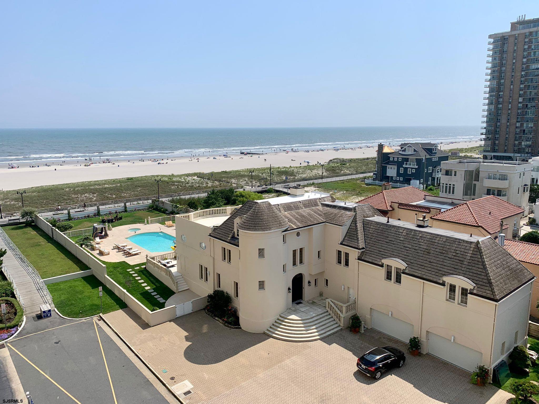 SUMMER RENTAL AVAILABLE-HUGE LUXURIOUS OCEAN FRONT ESTATE!! This truly one-of-a-kind beachfront home is the perfect fit for any size family!! Excellent location, right at the boardwalk and BEACH bordering Ventnor. Amazing OCEAN VIEWS throughout the house. Spacious open floor plan boasts marble tiles throughout the main floor and beautiful hardwood flooring throughout the second and third floors-it even has an ELEVATOR!!! Floating wooden spiral staircases, a HUGE 20 foot ceiling living room with brand new windows, lots of seating areas flowing into the stunning dining area, 2 powder rooms, gourmet eat-in kitchen, custom cabinetry and center island. So many places for all your friends & family to relax including a fireplace, tv’s, custom built-in bar w/wine cooler, & multiple sitting areas to view the gorgeous OCEAN!!Oversized Master Suite, ceiling to floor windows over looking the living room and ocean, ocean view jacuzzi, his and hers powder rooms, shower, double walk-in closet, drink fridge, sitting area and private beach front deck! 6 impeccably furnished bedrooms, lots of closet spaces and a MASSIVE top floor private balcony directly overlooking the pool and ocean!! The stunning exterior features a heated pool, hot tub, garden, fire pits, BBQ area and many relaxing seating options. Double attached garage, parking for 8+ cars. Linens, towels and robes included too. This is everyone’s perfect beach house!!!