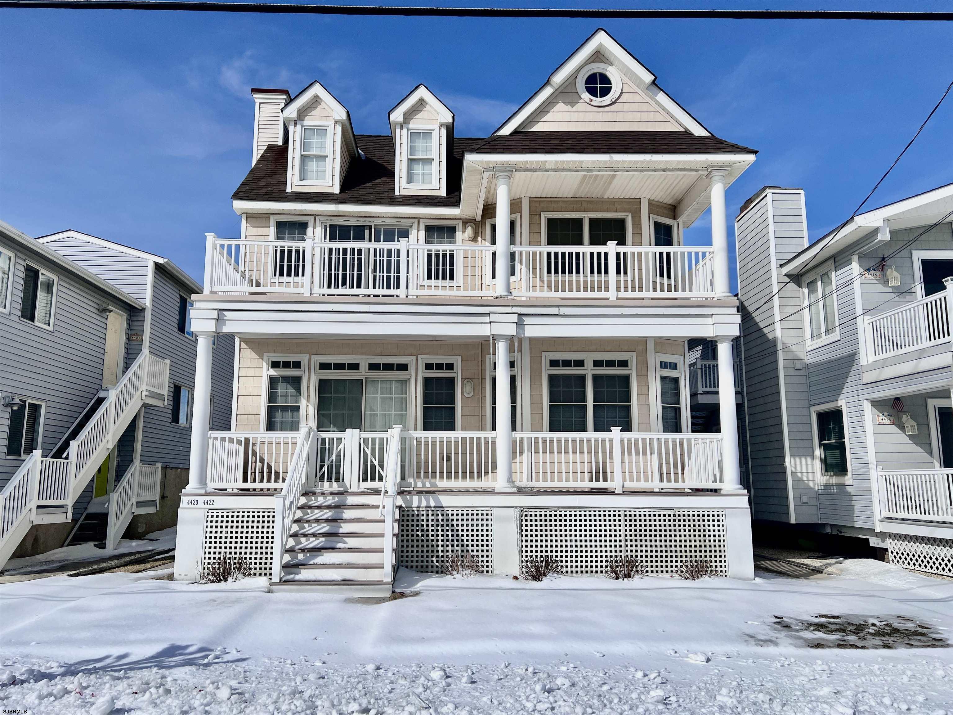 Come check out this Southend “BEST BUY” condo right across from the beach in OCNJ! This 2nd-floor beauty features 4 bedrooms, 2 full baths, ELEVATOR! The open floor plan includes a large kitchen with granite countertops, tile backsplash, full appliance package, and a spacious island with seating for three; a dining area; and a spacious great room with a gas fireplace. Additional highlights include hardwood flooring, cathedral ceilings, Anderson windows, gas heat & central AC, and a gas hot water heater. Enjoy outdoor living with a large front deck, rear deck, and a rooftop deck with ocean views (all decks recently resurfaced). The home also offers a maintenance-free exterior, vinyl railings, an enclosed outdoor shower, private storage room, and a 1-car private garage with 1 additional driveway parking spot — and it comes furnished! Great location (Steps to the beach). Great property (Ocean views). Great value. Great rental potential. See you on the Beach!