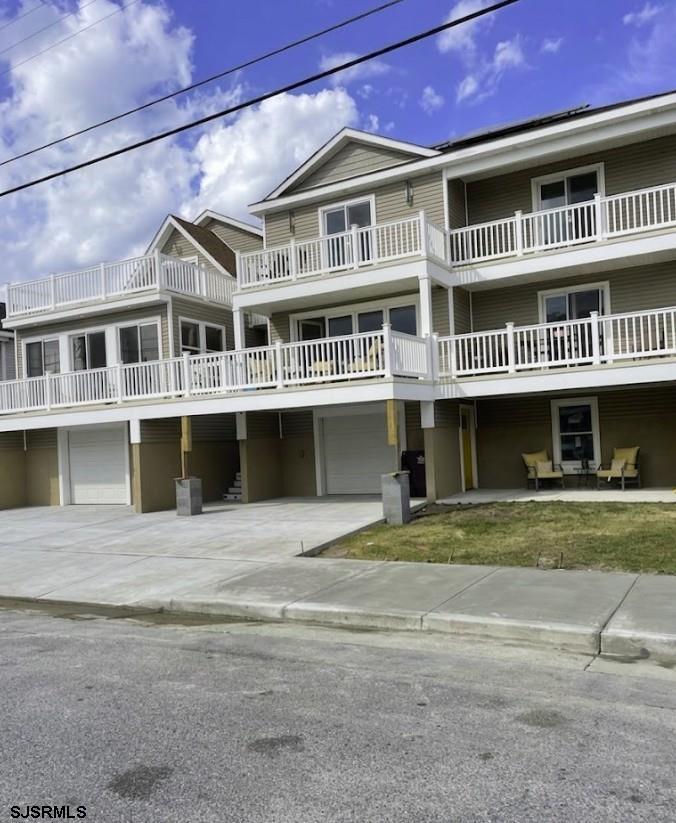 Welcome to 316 N Suffolk Avenue, a stunning newer-construction home offering approximately 4,800 sq ft just moments from the beach, boardwalk, and Ventnor’s top dining and shopping.  Tucked on a quiet street, this 3-story residence blends modern design, spacious living, and seamless indoor-outdoor flow.  The main level features an open-concept layout with a chef’s kitchen, quartz countertops, stainless steel appliances, and Pella windows and sliders. The Great Room is highlighted by a floor-to-ceiling bi-fold glass wall that opens directly to a large deck—perfect for entertaining.  A private elevator services all levels. The home also includes oversized garage space, large bedrooms, and multiple walk-in closets.  A private in-law or nanny suite with its own entrance offers flexibility for guests or multigenerational living, with gas, plumbing, and electric already in place for a future kitchen.  Highlights include: 9 decks for outdoor living; private elevator; custom-built pub/entertainment area; Butler’s pantry with warming tray and deck access; fenced yard with electric gate; 12-camera security system; four-zone HVAC; Navien tankless hot water heater; central vacuum; owned solar system; third-floor laundry hookup.  The top floor features two expansive primary suites with spa-style bathrooms, including radiant heated floors, Jacuzzi tubs with chromotherapy lighting, glass showers with rain heads and body sprays, towel warmers, double vanities, and built-in TVs.  With 4 full bathrooms, a powder room, and a highly flexible layout, this home is ideal as a primary residence or luxury shore retreat.  A rare opportunity to own a custom modern home in Ventnor City. Schedule your private showing today!  *Photos Coming Soon*