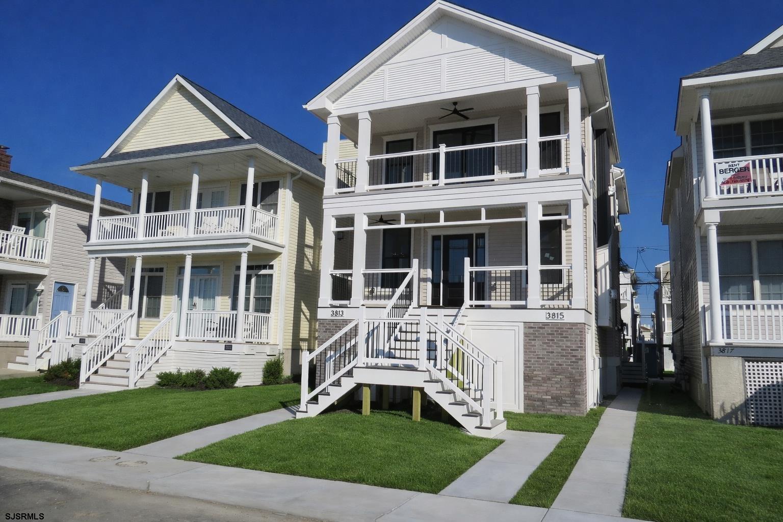 Brand New 1st Floor Condo. Ready for SUMMER 2026!  A beautifully designed NEW construction just 2 blocks from the Beach with 3 Bedrooms, 2 full baths, offers a perfect blend of style, comfort, and convenience.   Condo features a bright, open layout featuring a custom kitchen with stainless steel appliances, luxury vinyl plank flooring, and a spacious living area with gas fireplace, pre-wired for a built-in sound system, ideal for entertaining or relaxing and a primary bedroom with en suite bathroom.  Additional highlights include an attached 1 car garage, maintenance free vinyl and aluminum railings, composite decking, ceiling fans in each bedroom and covered front porch.  A great location, with close proximity to playgrounds, eateries and shopping. Whether you're searching for a beach getaway or a year round residence, this will be the place for you!  Completion date mid May.  Call for additional information.  Plans and specs in associated docs.