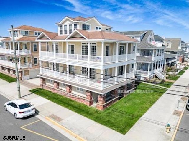 Rare 2nd fl BEACH BLOCK corner! JUST COMPLETED renovation (May 2026)! This 4br/3 full ba corner condo has been completely reimagined and spans the 2nd and 3rd floors with spectacular unobstructed ocean views from the extra-large wrap around deck and private master BR deck all just a few steps to the beach! Gas heat, central air, huge private garage with inside access and indoor shower room, ADDITIONAL separate parking space, 2 master suites, granite counters, stainless steel appliances, NEW lvp flooring and carpet, NEW led lighting, freshly painted, NEW furniture, NEW ceiling fans, NEW bathroom vanities and fixtures - the list goes on! Great as a second home just steps to the beach with endless ocean views or as an investment with over 70k rental income in place for  summer 2026! Convenient to all of the shops and dining Asbury Ave has to offer. This property truly has it all - a 2nd fl. corner prime beach block location with unobstructed ocean views, a just completed beautiful remodel, and immediate income for the buyer. Don't miss this awesome opportunity!