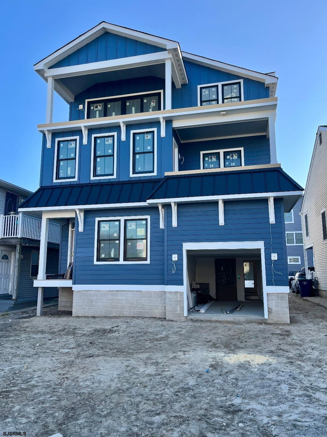 New Construction! Close to Beach ! Room for a Pool ! This Custom Designed 5 bedroom 4 bath home (3,357 Square feet of Living Space) fully framed and ready for siding and drywall. Pictures coming soon, available Now for showings. This home has an anticipated completion by end of summer.   Large 1st Floor family/Game Room, Large 3rd Floor Great Room (700 square feet) which includes Living Room with Fireplace, dining area, kitchen with center island, Upgraded Appliance package, Pantry with Hot and Cold Sink.   Three Balconies (390 Square Feet) Garage and Storage (238 Square feet), Gas Heat and Central Air, Elevator from garage level to 3rd floor (4 Stop Elevator),Large Covered Rear Patio (25.3 x 13.3) with Floor Pavers. Complete Home Specification and Feature List available upon request. A Must see home, call for appointment.