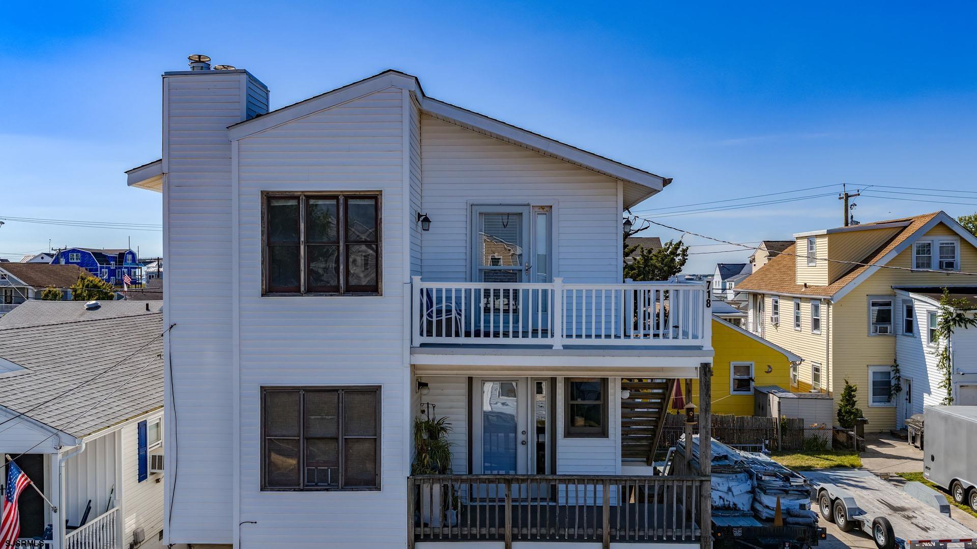 Rare opportunity to own an affordable, turnkey beach retreat in the heart of Ocean City!  This spacious 2 bedroom, 2 bath second-floor condo offers approximately 890 square feet of comfortable living space—larger than most 2-bedroom units on the island—and comes fully furnished, making it ready to enjoy from day one.  Enjoy easy walks to the bay, beach, boardwalk, Asbury Avenue shopping and dining district, grocery stores, and Ocean City's popular weekly farmers market. Whether you're looking for a weekend getaway, investment property, or year-round residence, you'll love the ability to leave the car behind and enjoy everything Ocean City has to offer.  Additional highlights include two off-street parking spaces, a private storage room, and a front deck perfect for enjoying your morning coffee or evening breeze.  With a proven rental history generating $20,000 in seasonal income in previous years, strong upside potential, and no monthly condo association fee, this property offers exceptional value at an increasingly hard-to-find price point in Ocean City.  Move-in ready, fully furnished, and ideally located—718 Simpson Avenue is the opportunity you've been waiting for.