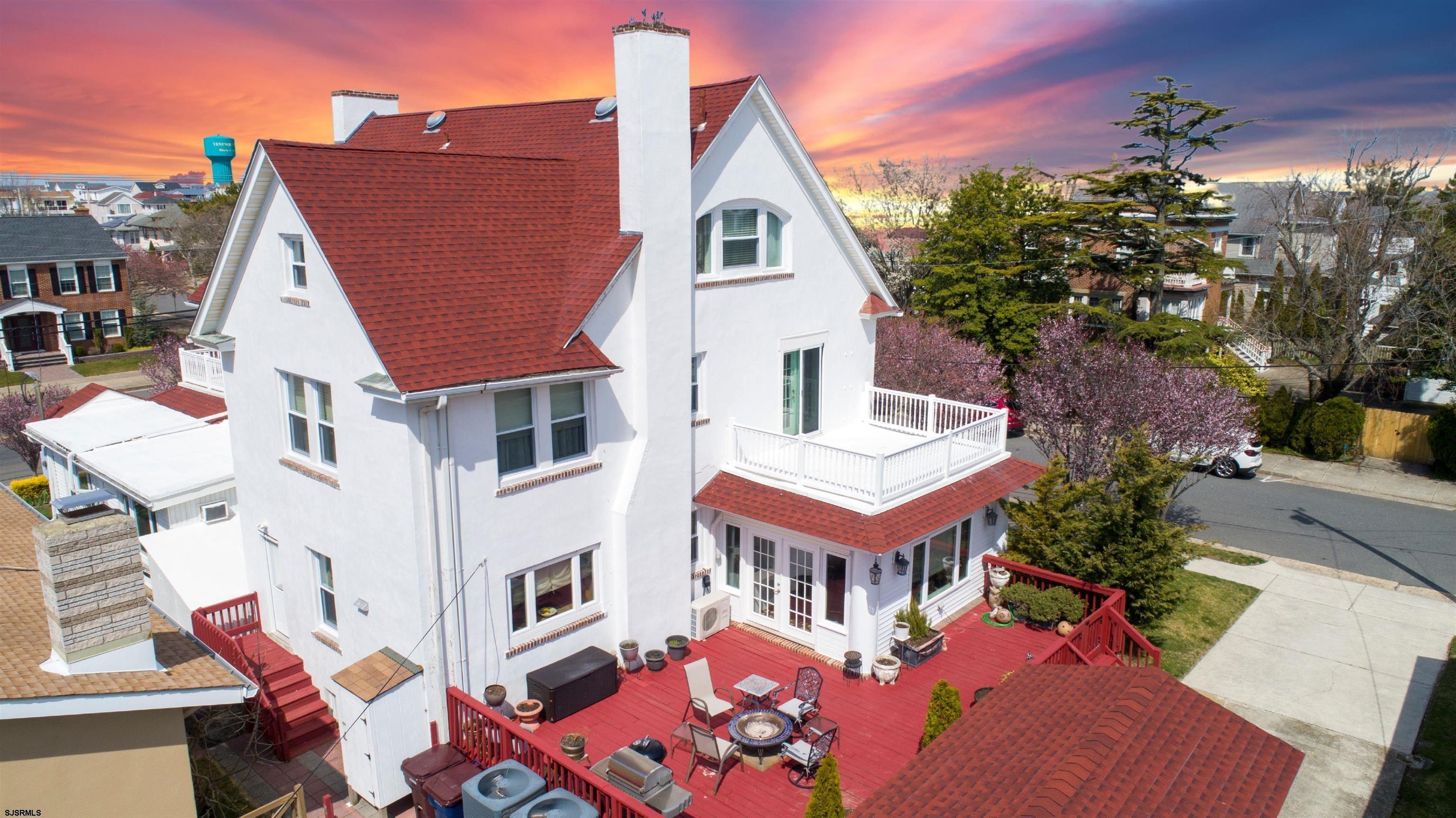 WEEKLY RENTAL in one of Ventnor's most desirable neighborhoods in the prestigious St. Leonard's Tract. Set on a spacious corner lot just moments from the beach, boardwalk, and bay, this spectacular 3-story home offers nearly 4,500 square feet of beautifully appointed living space for an unforgettable shore vacation.  Designed to accommodate large families and groups, the home features 8 bedrooms, 3 full bathrooms, and 2 half bathrooms. The first floor includes an additional bedroom with its own private entrance, providing extra privacy for guests. Spacious gathering areas throughout the home make it easy to relax, reconnect, and entertain, including a welcoming living room with a built-in bar, a bright sunroom that opens to the patio, and a dedicated office for those needing to work remotely.  Enjoy multiple outdoor spaces perfect for morning coffee or evening cocktails, unwind with a book in the top-floor library, or rinse off after a day at the beach in the convenient outdoor shower. An elevator provides easy access between the first and second floors, adding comfort and convenience for guests of all ages.  Just 2 blocks to the beach and a short stroll to restaurants, ice cream shops, movie theater, playgrounds, pickleball and tennis courts, basketball courts, and volleyball courts, this exceptional home places the very best of the Jersey Shore right at your doorstep.