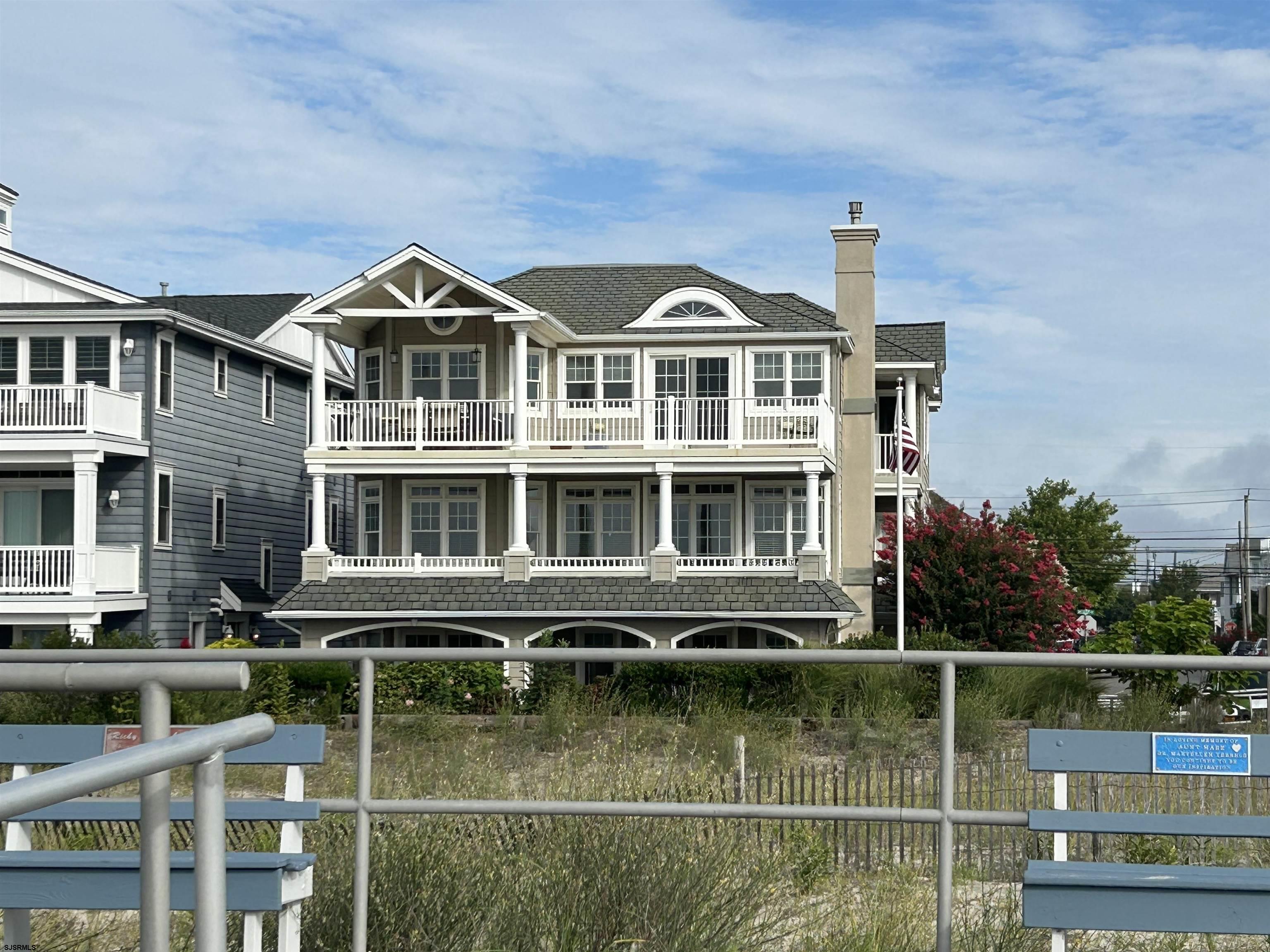 Fabulous second floor beachfront on a corner lot in the prestigious Gold Coast of Ocean City. Lots of room for family and guests in this large four bedroom five bath condo with a bonus room included on ground floor.   Unusually private given the lot orientation allowing proximity to all the boardwalk amenities Ocean City is famous for!  This spacious beachfront home has vaulted ceilings , lots of storage and a classic gourmet kitchen . The outside space allows you to enjoy all the benefits of beachfront living, featuring covered and uncovered decks with ocean views galore.   Rare Opportunity to also own a whole building on the beach as the first floor is also available for purchase at this time . Great investment for long term gain and chance to control on of the best corners in Ocean City's nicest location!