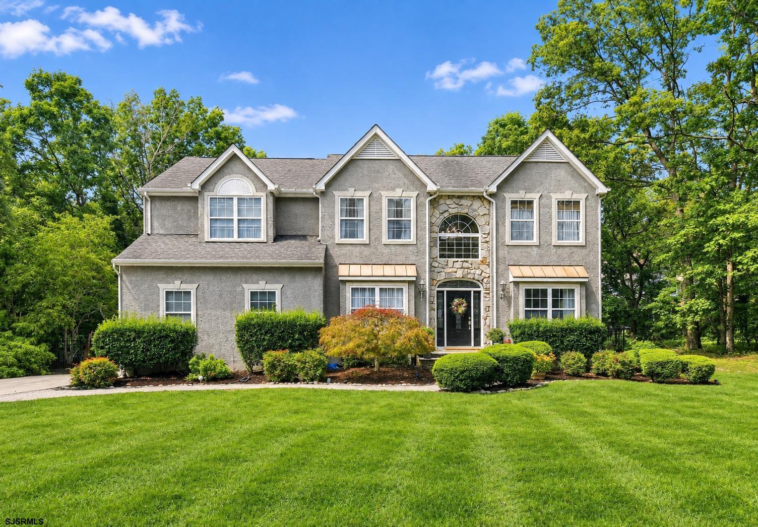 Welcome to 115 Lighthouse Lane, beautifully situated in the desirable Harbor Acres community of Egg Harbor Township. This impressive 4 bedroom residence offers over 3,000 square feet of thoughtfully designed living space, featuring an exceptional blend of style, comfort, and modern updates throughout.  The inviting interior showcases a stunning updated kitchen with a center island, a dramatic two-story great room with cathedral ceilings, a dedicated study, and beautifully updated bathrooms. Hardwood and tile flooring complement the main living areas, while wall-to-wall carpeting adds warmth and comfort throughout the home. The spacious finished basement provides valuable additional living space, perfect for a recreation room, home gym, media area, or guest space. The open, two-story design creates an airy and welcoming atmosphere, with generous living areas ideal for both everyday living and entertaining. Numerous updates and upgrades throughout the home make this property truly move-in ready. Outdoors enjoy a gorgeous inground pool, fenced yard, private patio, and paver driveway, providing both functionality and outdoor enjoyment.  Don't miss this one!