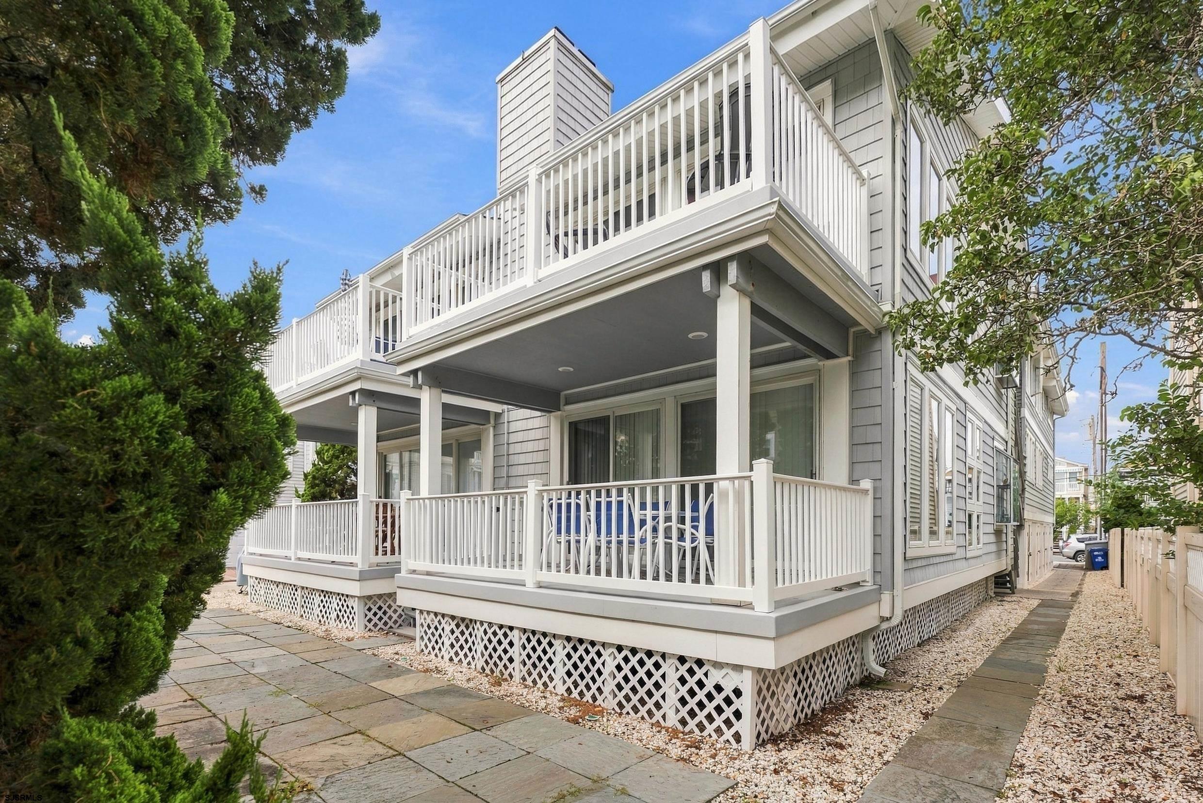 Entertain • Escape • Invest with this expansive Beach Block, 2nd Floor property with deeded direct access to the OCNJ boardwalk! Situated conveniently one house from the beach in a well kept four-plex, this condo offers endless opportunities- rent, renovate, or just move right in and enjoy the sounds of the ocean as you sit on your deck. You will be delighted in the spacious, open, sunny flow of this unit, with true hardwood flooring, an abundance of windows, and vaulted ceilings with skylights to illuminate the space. Every bedroom has direct access to a bathroom. There is plentiful storage, including a coat closet, pantry/cleaning closet, and private storage shed. The master suite offers a walk-in closet + front deck with egress steps. The exterior is low maintenance and offers a deeded walkway access to the beach and boardwalk. This condo has been lovingly maintained and Sellers will provide a new roof and new heater prior to closing. The association is well managed and proactive in their maintenance.