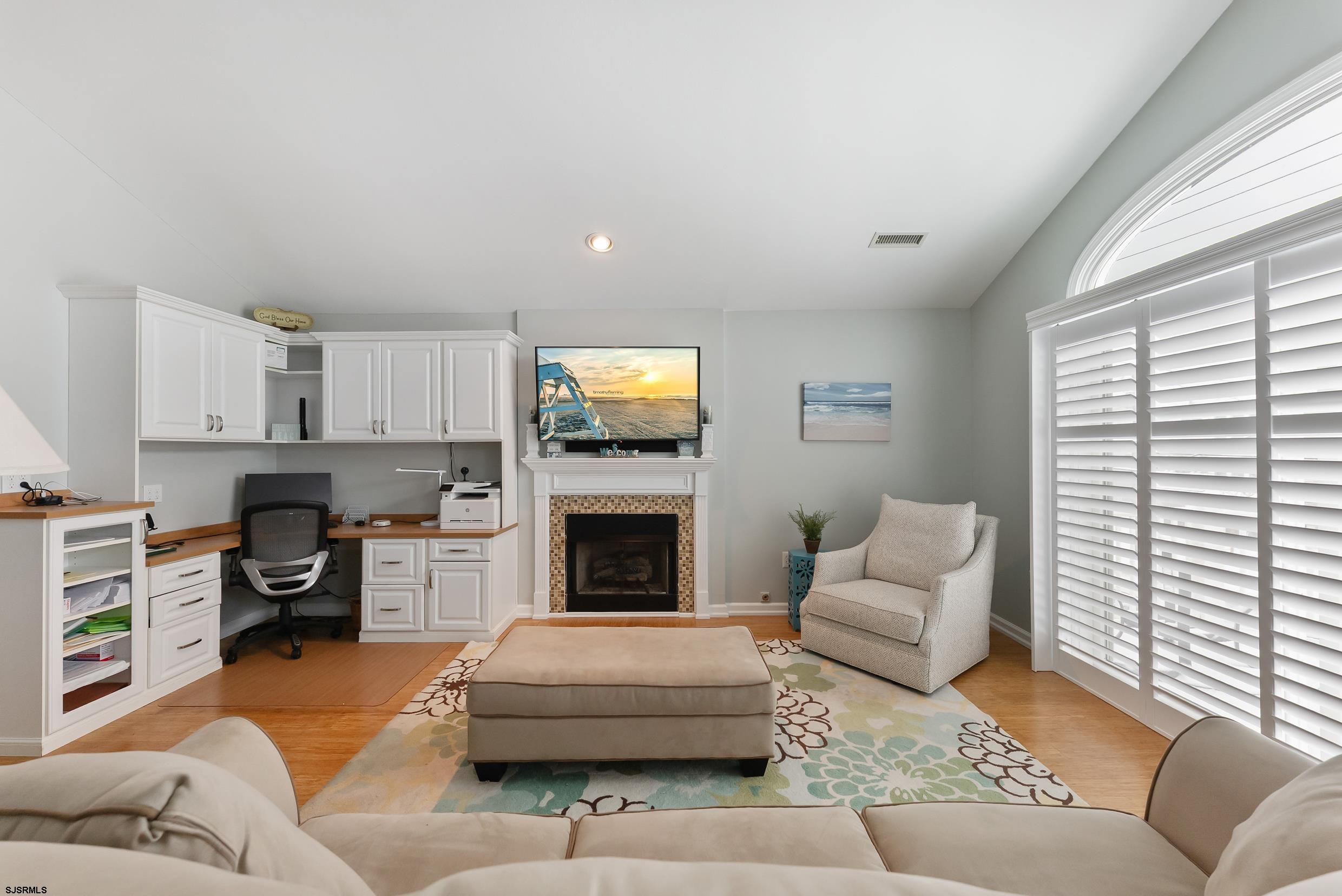 Southend Best Buy! Welcome to 4918 Central, 2nd fl. - a beautifully updated 4br/2ba condo with ocean views and a large rooftop deck! Just steps to the beach, this exceptional home includes a list of updates and upgrades that you have to see to believe! Gas heat/central air, attached garage, vinyl siding, front, rear, & rooftop decks, and hardwood floors are all here on a large 40x100 ft lot! Every aspect of the interior and exterior of this home has been wonderfully maintained and meticulously updated including a NEW AC unit (2026), NEW exterior doors and sliders, NEW plantation shutters (2023), NEW exterior trim/siding, and fiberglass deck (2020), NEW Andersen windows (2020), NEW roof (2017), NEW gas furnace (2017), NEW rooftop deck (2017)! The list goes on and on including custom built-ins by Asbury Kitchen and updated bathrooms! Do not miss this amazing opportunity to be beach block in the coveted, quiet Southend with great ocean views! More pictures coming soon.