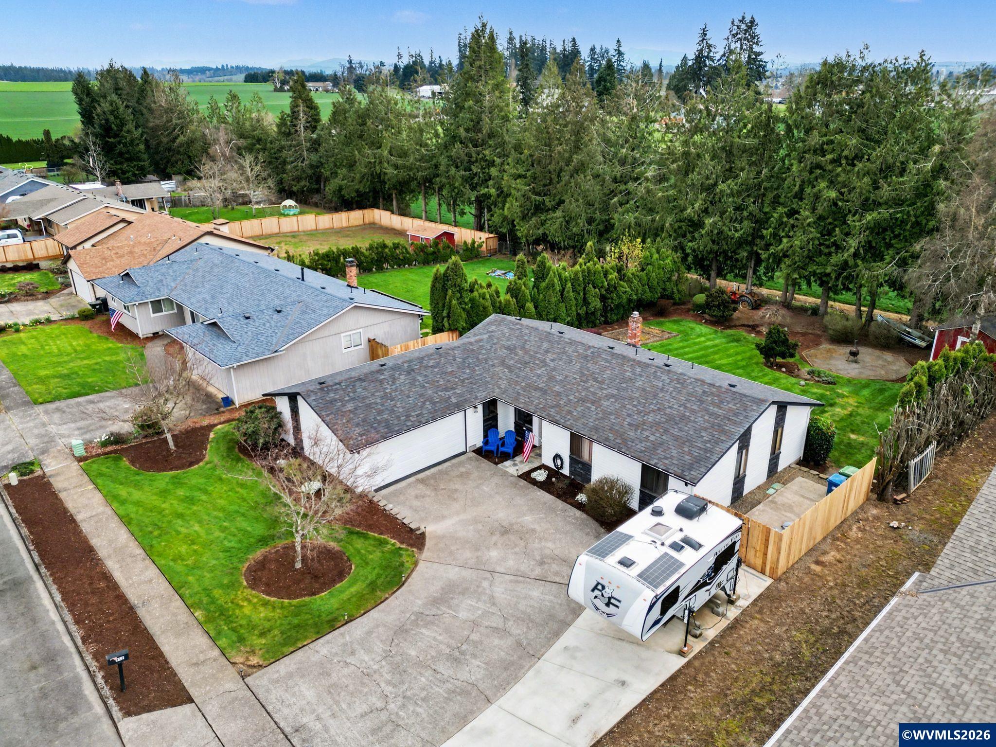 Accepted Offer with Contingencies. The backyard you've been waiting for in Sublimity!  151' deep lot backs up to farmland with great views.  RV parking space.  Meticulously maintained home has recent roof, flooring, water heater & more.  Kitchen is tastefully updated with granite counters, tile backsplash, painted cabinets & stainless steel appliances.  Garage is nicely set up with mat flooring & heater.  Gas fireplace in living room.  Backyard has patio, shed & outdoor firepit. Open House Sun(4/12) from 12pm-2pm.