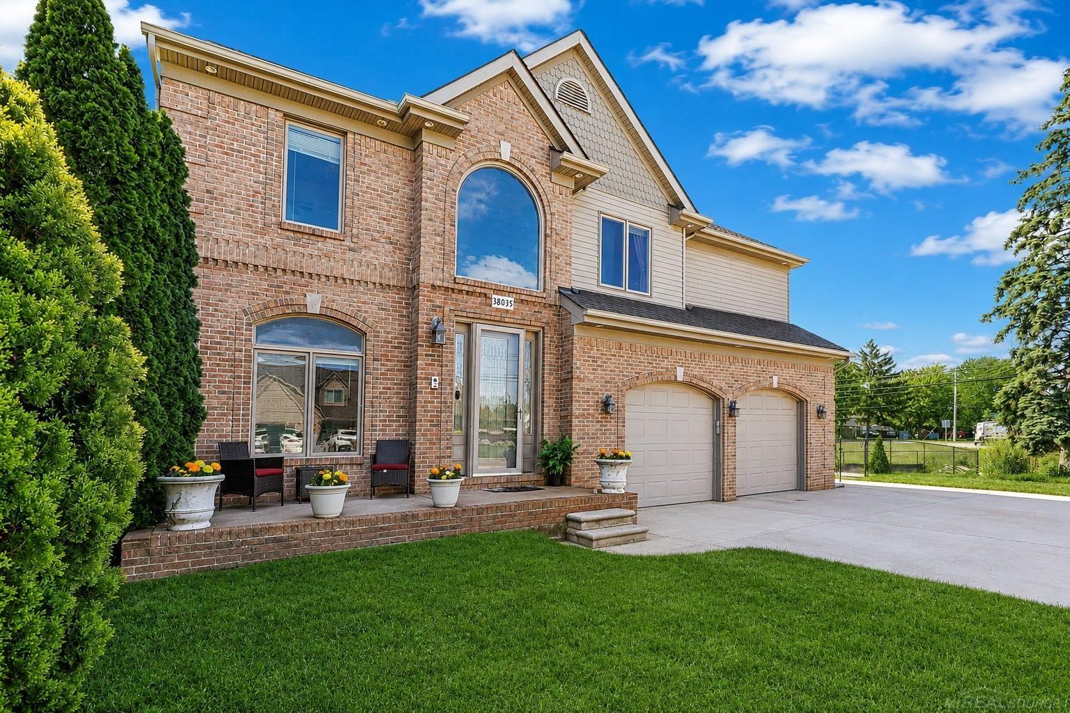 ***OPEN HOUSE: SATURDAY, JUNE 6TH, 1:00-3:00 PM***  Wake up to true waterfront living in this canal-front home with direct access to Lake St. Clair, located in the desirable Pointe Rosa subdivision.  Built in 2003 and offering nearly 2,000 square feet, this home stands apart from much of the surrounding waterfront inventory with its newer construction and versatile layout. Thoughtfully designed with multiple living spaces, it offers flexibility and functionality rarely found in canal homes in this area.  The main floor features a bright, open living room, dining area, and kitchen, along with a separate sitting room and private office, perfect for working from home, hosting guests, or adapting the space to fit your needs. The first-floor office can easily be transformed into an additional bedroom if desired.  Upstairs, the spacious primary suite includes a full bath and walk-in closet, while the open layout overlooking the main living area creates an airy feel and provides space for a second family room, lounge, or defined sleeping area.  Major updates already completed for you include the seawall and a new furnace in 2025, along with refreshed backyard landscaping and the addition of a new perimeter fence. Step outside to your waterfront patio and enjoy boating, entertaining, or simply relaxing with easy access to Lake St. Clair.  Located just off Jefferson and south of 16 Mile, you're minutes from Metropark, marinas, dining, and everything that makes this one of Macomb County's most sought-after waterfront areas.  If you've been searching for a newer-built canal home with space, flexibility, and true waterfront access, this is a rare opportunity.