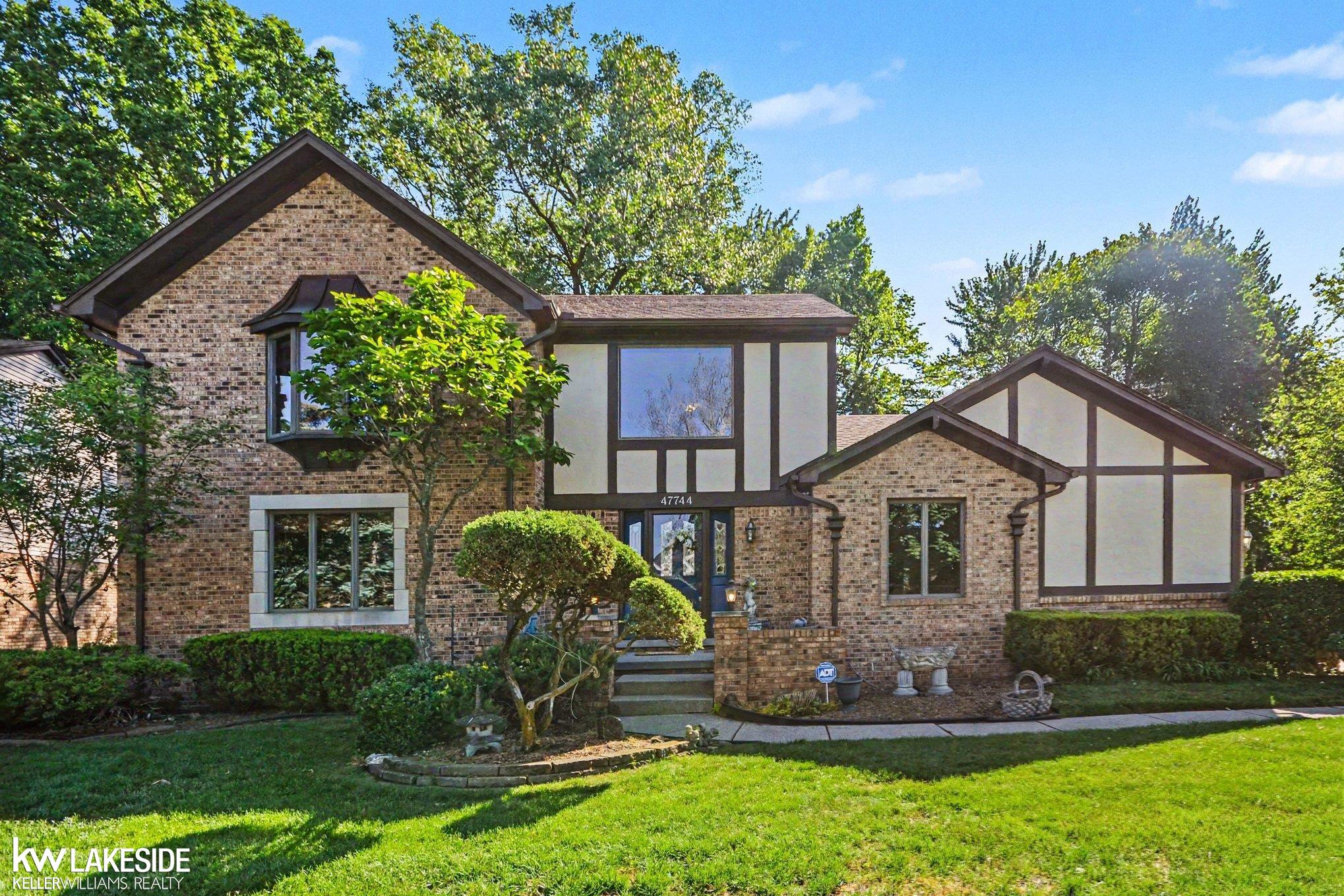 Custom-built Tudor style 3-bedroom 2.5-bath plus den. Originally designed and constructed by an architect-builder for his own family; showcasing superior craftsmanship, enduring quality, and carefully curated details throughout. Current owners have lovingly enjoyed and maintained this special home for over 30 years. This home offers spacious living and timeless charm. Enjoy the large partially updated kitchen with granite counters and attached dining room, perfect for entertaining. The great room showcases a grand stone fireplace with gas insert, complemented by stunning floor to ceiling woodwork. The main floor office/den showcases exquisite crown molding and beautiful hardwood flooring, while offering the flexibility to be easily converted into a 4th bedroom. Elegant two-story foyer with abundant natural light and welcoming entryway. Upstairs you'll find 3 generously sized bedrooms, including a spacious primary suite with a bay window and private en-suite bath, plus an additional full bath with oversized whirlpool tub. The finished basement provides extra living space along with plenty of storage including a cedar closet. An extra-wide driveway provides ample parking and leads to the 2.5 car, side-entry heated garage. Step outside to your fully fenced and tree lined backyard oasis complete with a large 3-tier deck hosting a pergola and gazebo- ideal for entertaining and relaxing on warm summer evenings. This home truly has so much to offer, schedule your showing today!