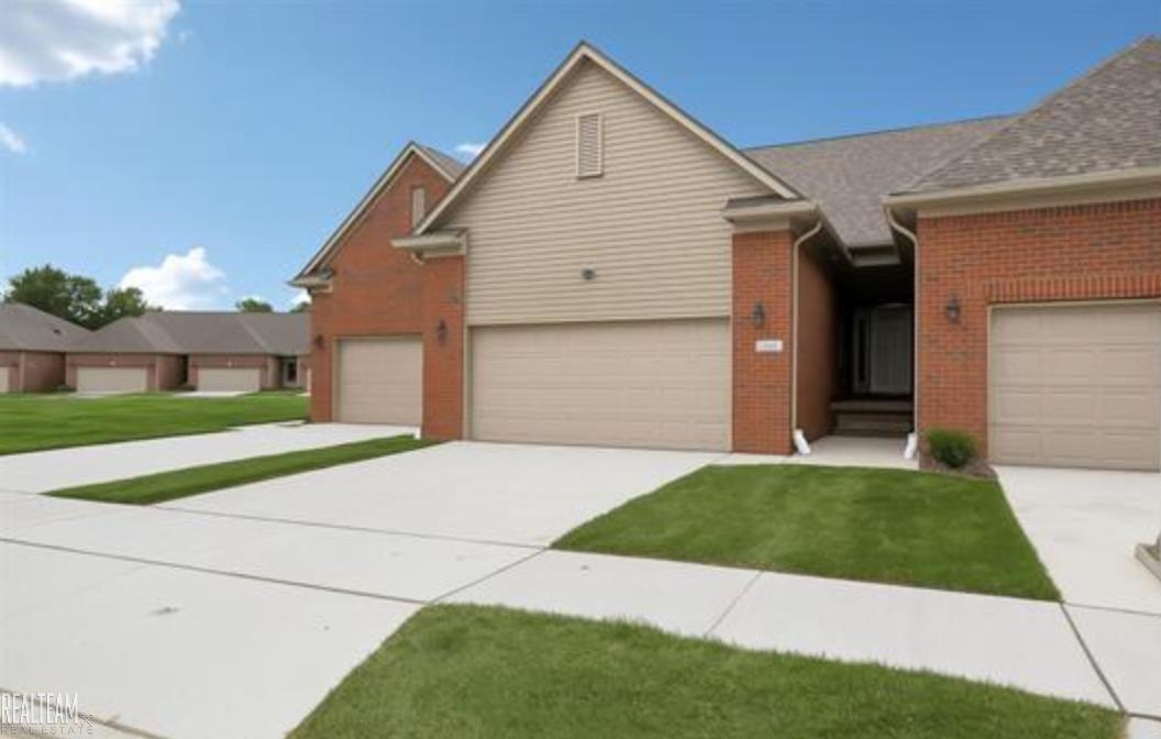 **OPEN HOUSE FRIDAY 7/3/26 THROUGH MONDAY 7/6/26 FROM 12PM-4PM** $4,000 BUILDER INCENTIVE FOR THIS UNIT ONLY. Builder incentive includes 11 recessed lights and upgraded cabinets.  Welcome to Stonehenge, a centrally located community nestled in a quiet neighborhood with no traffic noise from major roads. This brand-new, ranch condo offers an open and inviting layout with thoughtful design details that maximize space and comfort. The main living space features cathedral ceilings with a central kitchen island showcasing granite counters and bar seating, perfect for everyday living and entertaining. The kitchen is designed to accommodate a gas range/oven. Throughout the rest of the condo, you'll find 9' ceilings, tasteful finishes, and a layout that blends style with functionality. Convenience is built in with a first-floor laundry room complete with a laundry tub. Each of the 2 bedrooms are complete with walk-in closets. The primary suite is highlighted with dual vanities and a fully tiled stand-up shower with glass door, while the secondary bathroom offers a tub with a ceramic tile surround. A concrete patio is also included by the builder for outdoor enjoyment. The large basement with an egress window offers excellent potential for a third bedroom, home office, or entertaining space. There's still time to pick your flooring if you hurry!