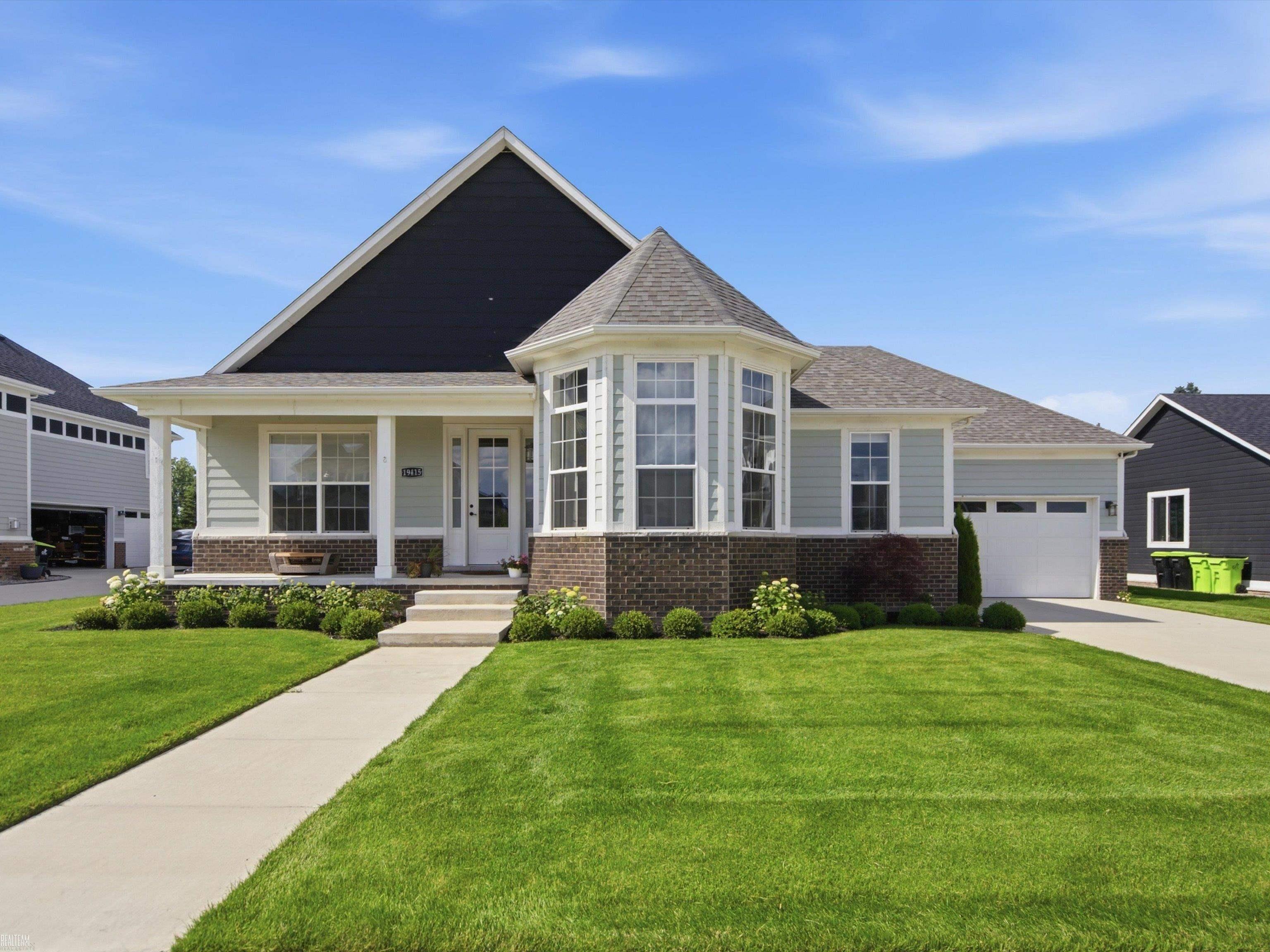 **OPEN HOUSE 7/12/26 FROM 11AM-1PM** Built in 2022, this beautiful ranch home offers modern design and comfortable living. The open-concept floor plan is perfect for both everyday living and entertaining, featuring a spacious living room highlighted by a cozy fireplace that serves as the focal point of the space.  The large kitchen is designed with both style and functionality in mind, showcasing ample cabinetry, generous counter space, and a center island with seating, making it the perfect gathering spot for family and friends. The adjoining dining area flows seamlessly into the main living spaces, creating an inviting atmosphere throughout.  The private primary suite provides a relaxing retreat with a spacious walk-in closet and en-suite bath. Additional bedrooms offer flexibility for guests, a home office, or growing households.  Step outside to enjoy the covered patio overlooking the backyard, providing the ideal space for outdoor dining, morning coffee, or relaxing evenings. Combining modern amenities and thoughtful design, this move-in-ready ranch is one you won't want to miss.