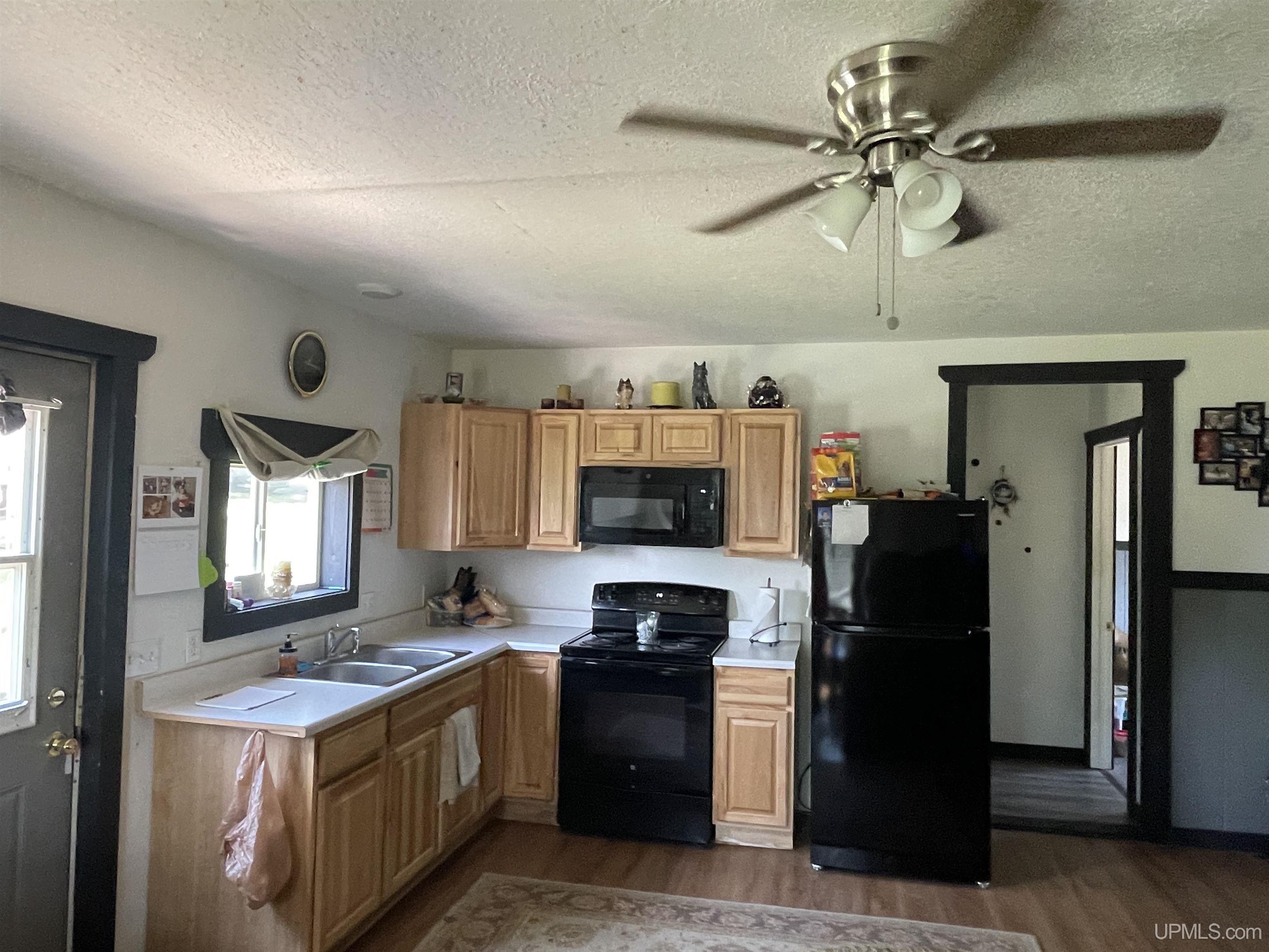3rd image of 100 Carpenter Ave, Iron Mountain, MI 49801 | MLS# 50216331
