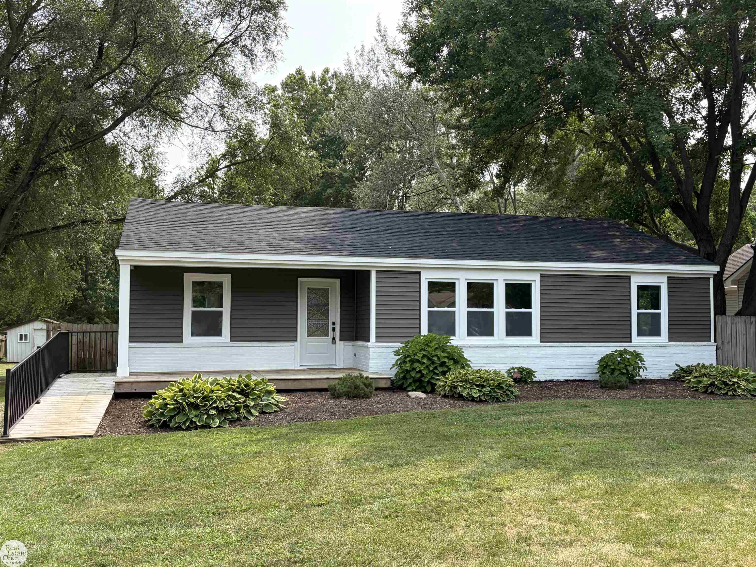 Welcome home to this beautifully updated ranch situated on a spacious .74-acre lot in Shelby Township!This 3-bedroom, 1-bath home is move-in ready, with numerous recent updates already completed. Improvements include new siding, windows, roof, interior and exterior doors, flooring, fresh paint, and all new appliances. The refreshed interior offers a clean, inviting feel with the ease of convenient one-level living.  Additional features include attic space for storage, a shed for added storage and outdoor equipment, and immediate occupancy. Keys are provided at closing, making it easy to move right in and enjoy your new home!  Conveniently located near Van Dyke Avenue and 21 Mile Road, with easy access to shopping, dining, parks and major roadways. Enjoy nearby River Bends Park and all it has to offer, including walking trails, fishing, playgrounds and outdoor recreation. Located within Utica Community Schools, including Wiley Elementary, Eppler Junior High and Utica High School.  A wonderful opportunity for a buyer looking for an updated, affordable ranch in a desirable Shelby Township location. Nothing to do but move in and enjoy!