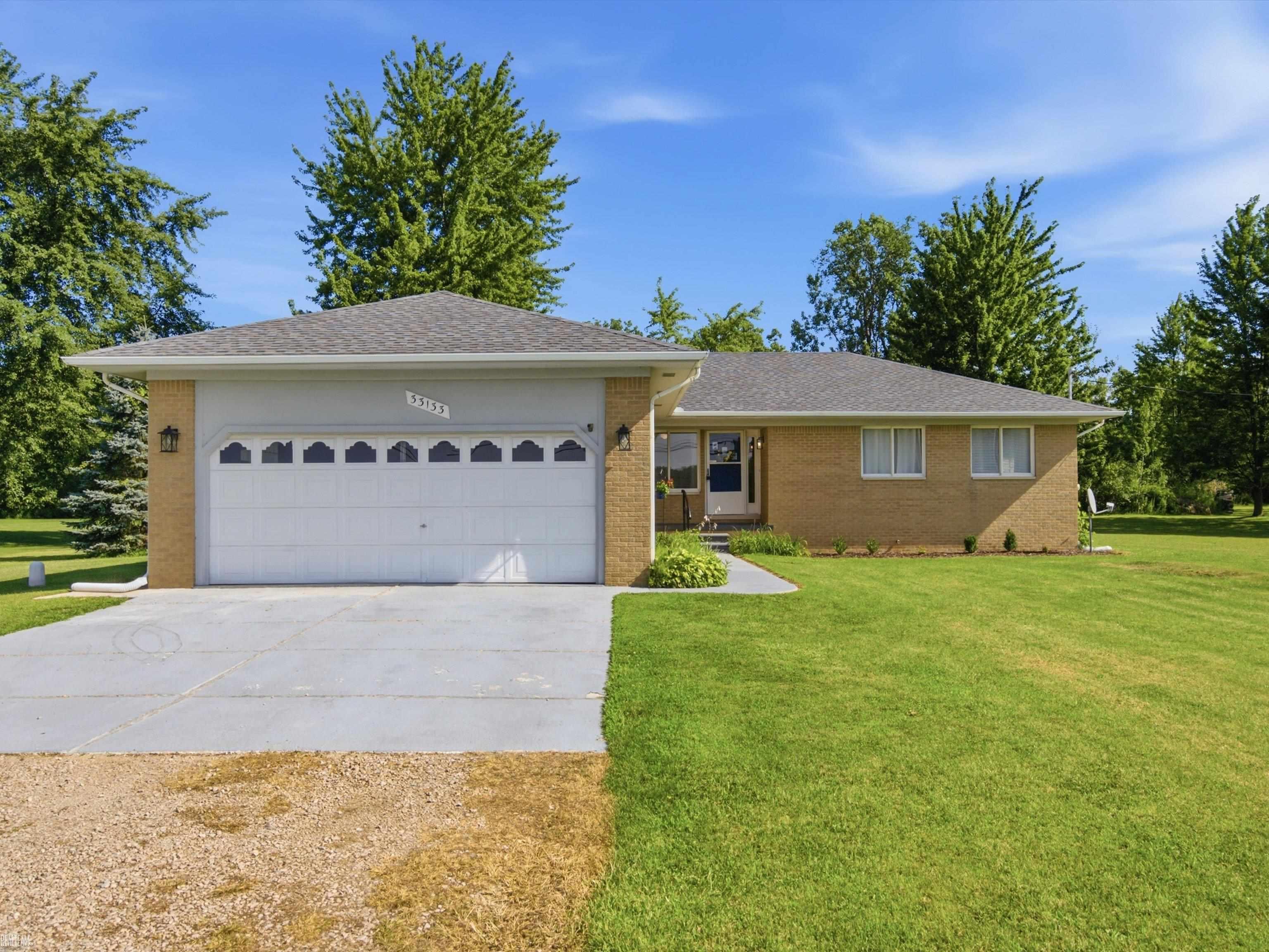 **OPEN HOUSE 8/22 1PM-3PM.** Experience the charm of country living with this inviting 3 bedroom, 2 bath ranch situated on a spacious 1.34-acre lot in Richmond. The home features a welcoming living room with a cozy fireplace, creating the perfect place to gather with family and friends. The functional layout offers plenty of space for everyday living while providing endless opportunities to make it your own.  Step outside onto the deck, an ideal spot for morning coffee, outdoor dining, or simply enjoying the peaceful views of your expansive backyard. With over an acre of land, there's ample room for gardening, outdoor recreation, pets, or future additions. The property also features a barn, offering additional storage space, workspace, or endless possibilities for hobby enthusiasts or outdoor projects. Updates include a new roof and updated flooring throughout.