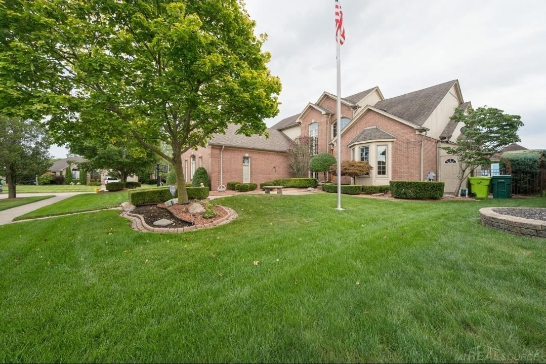 Welcome to this spacious and beautifully appointed 5-bedroom split-level home, offering an incredible combination of comfort, luxury, functionality, entertainment space, and outdoor amenities. This home has room for everyone and features an impressive list of amenities both inside and out! Enjoy the convenience of a private first-floor master bedroom featuring a luxurious bathroom with a jacuzzi tub and separate stand-up shower. The kitchen is designed for both everyday living and entertaining, featuring stainless steel appliances, granite countertops, plenty of cabinet space, and a walk-in pantry. A convenient first-floor laundry room adds functionality and ease to your daily routine. The upper level features four additional bedrooms and a full bathroom, providing plenty of space for family, guests, or a home office. Additional living spaces include a study/den, offering flexible options for a home office, playroom, hobby area, or relaxing retreat. The finished garage features laminate flooring, plenty of cabinets, and granite countertops, creating an incredible workspace for projects, hobbies, storage, or entertaining. The garage also includes a separate entrance to the basement. TV wall included. The finished basement is perfect for entertaining and relaxing, featuring a full bar, large storage area, and infrared sauna. This space provides the perfect setting for hosting friends and family or enjoying your own private retreat. TV wall included. Enjoy summer in your own backyard with an in-ground pool featuring a brand-new liner and brand-new steps installed in 2026. Whether you're entertaining guests or relaxing poolside, this backyard is ready for summer fun. The property features an extra-large driveway with two basketball nets, creating a private basketball court- perfect for recreation, family fun, and outdoor games. BATVAI.