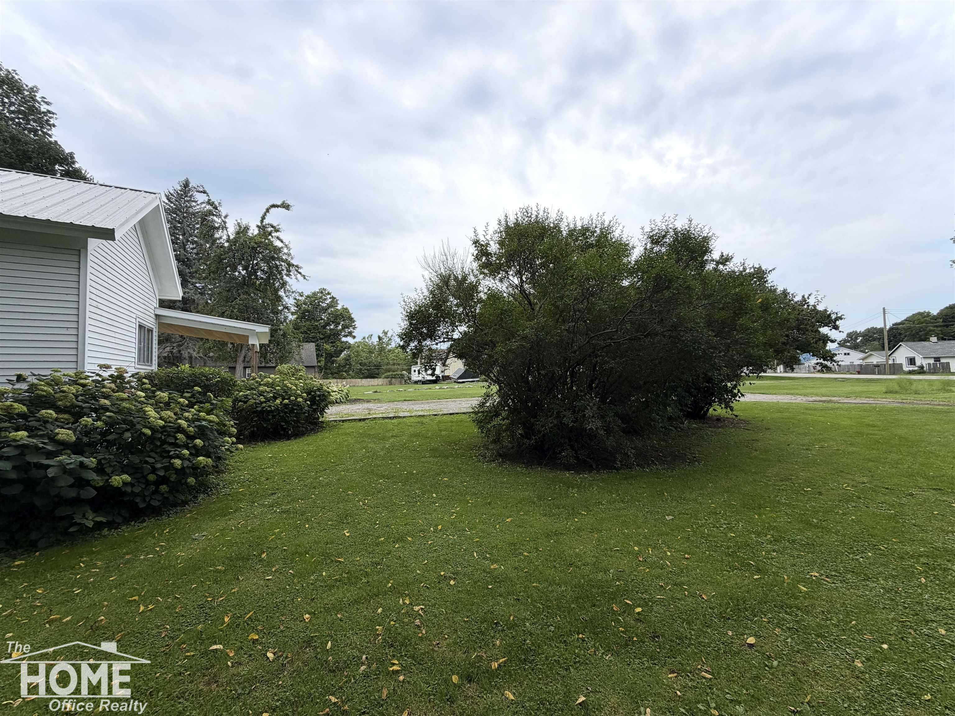 Listing Photo 2 - Condo for sale in building located at 115 E Grand River Ave, Bancroft, MI 48414 - Unit #