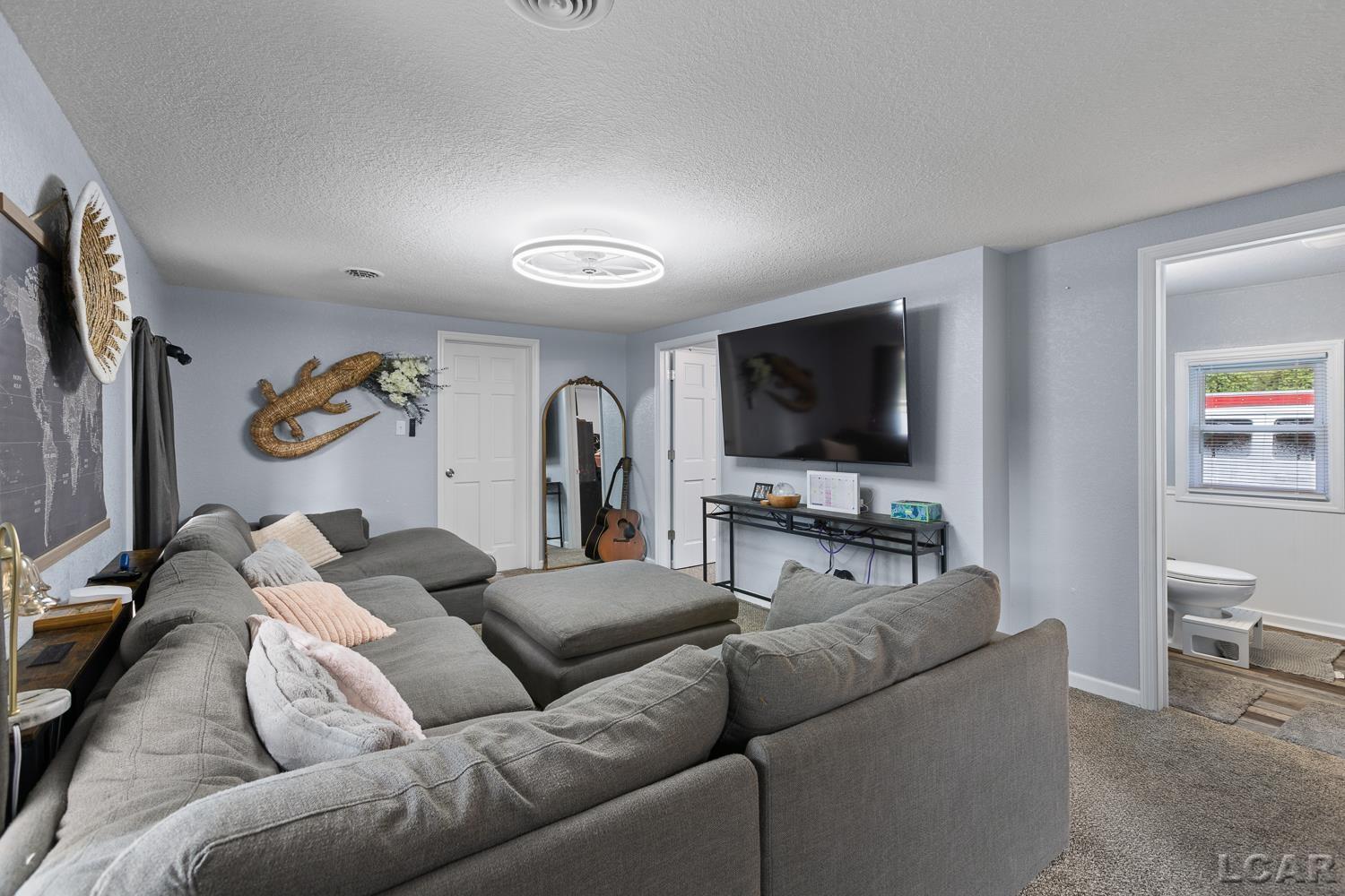 Photo 2 of Single family home for sale at 4171 Woodland Ave, Manitou Beach, MI 49253 | MLS# 50220772 | Listing updated on 2026-09-04