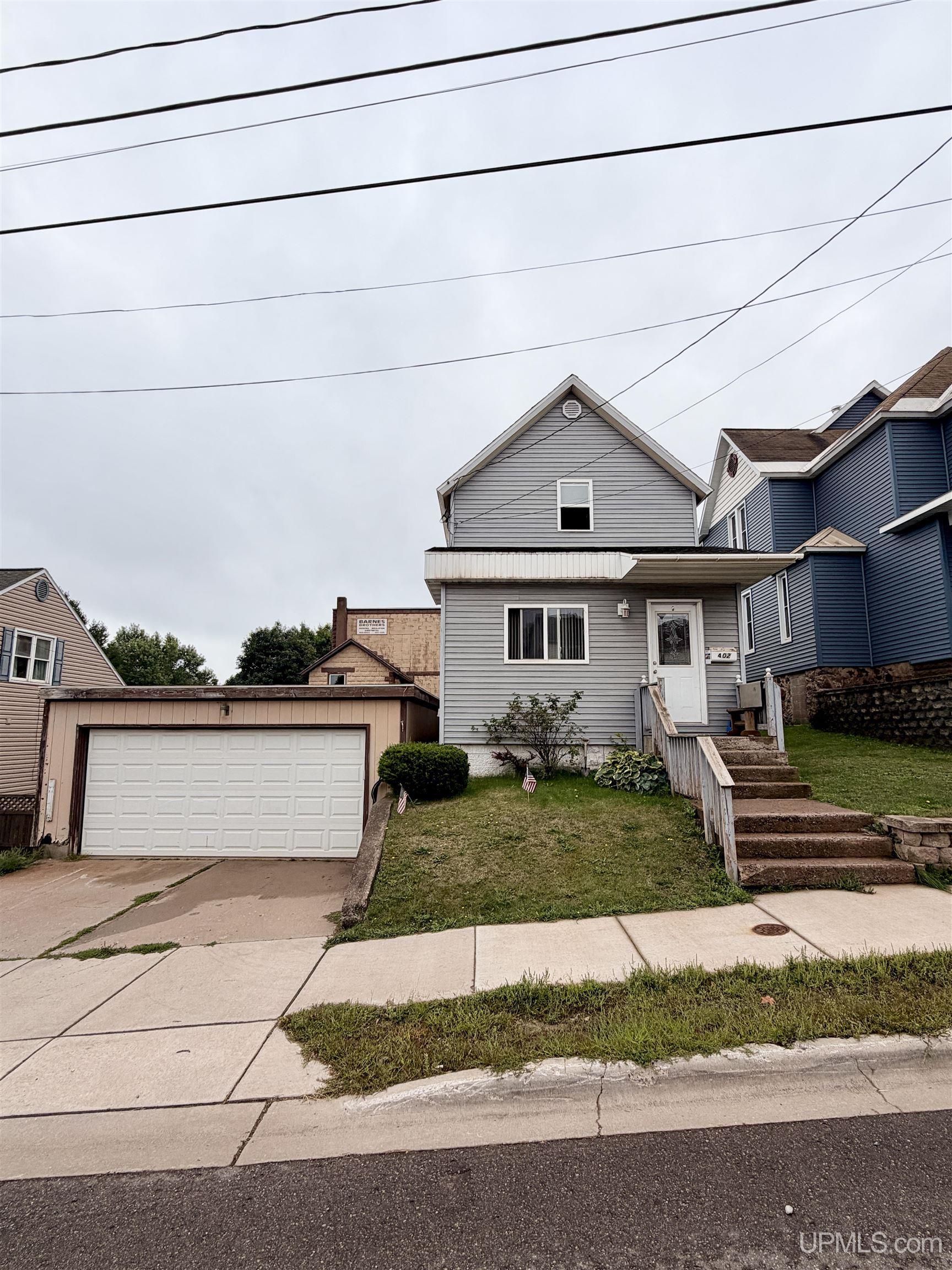 Photo 1 of Single family home for sale at 402 E Empire St, Ishpeming, MI 49849 | MLS# 50220780 | Listing updated on 2026-09-03