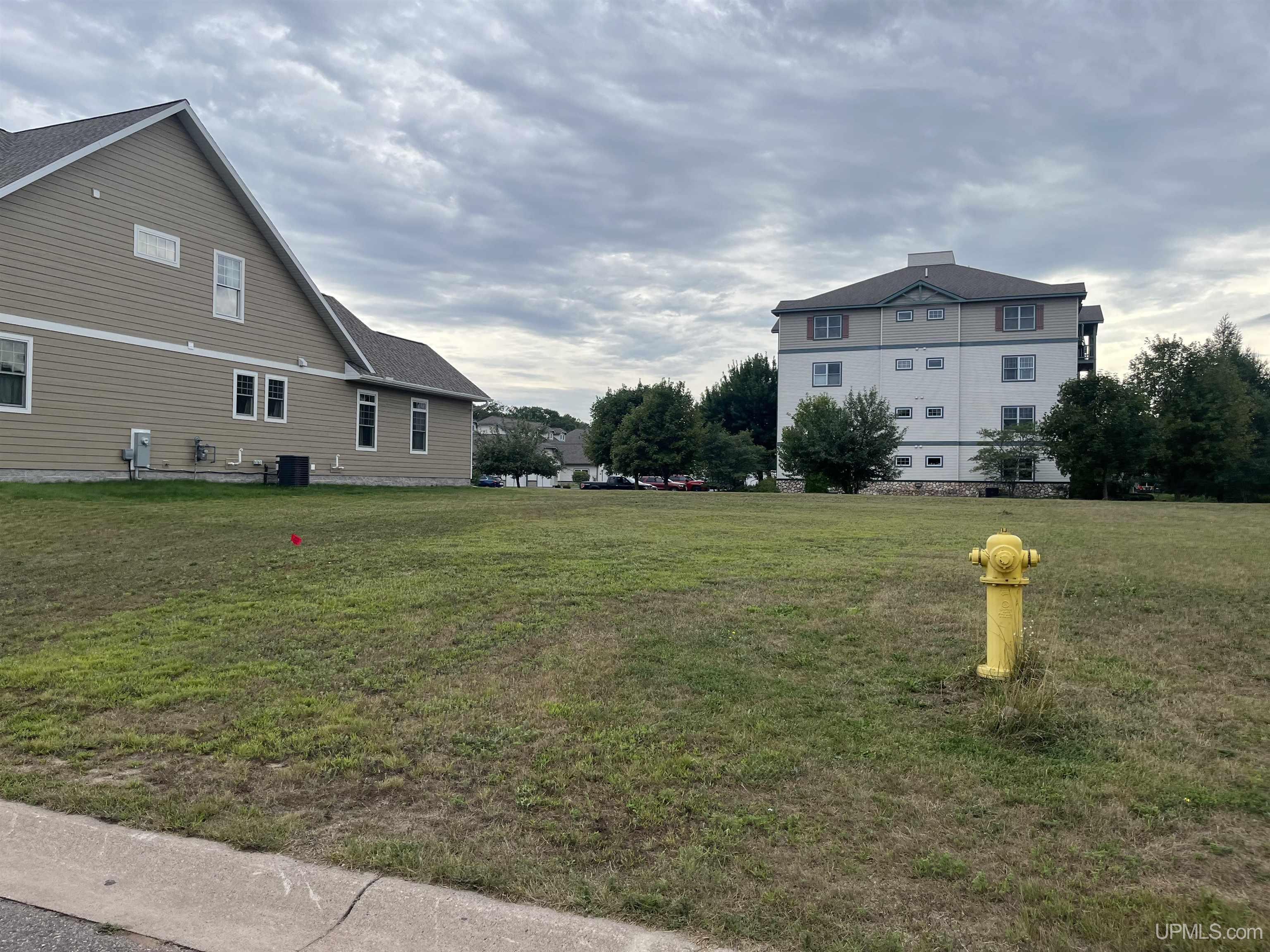 Photo 1 of Land for sale at 1313 Picnic Rocks Dr, Marquette, MI 49855 | MLS# 50221434 | Listing updated on 2026-09-21