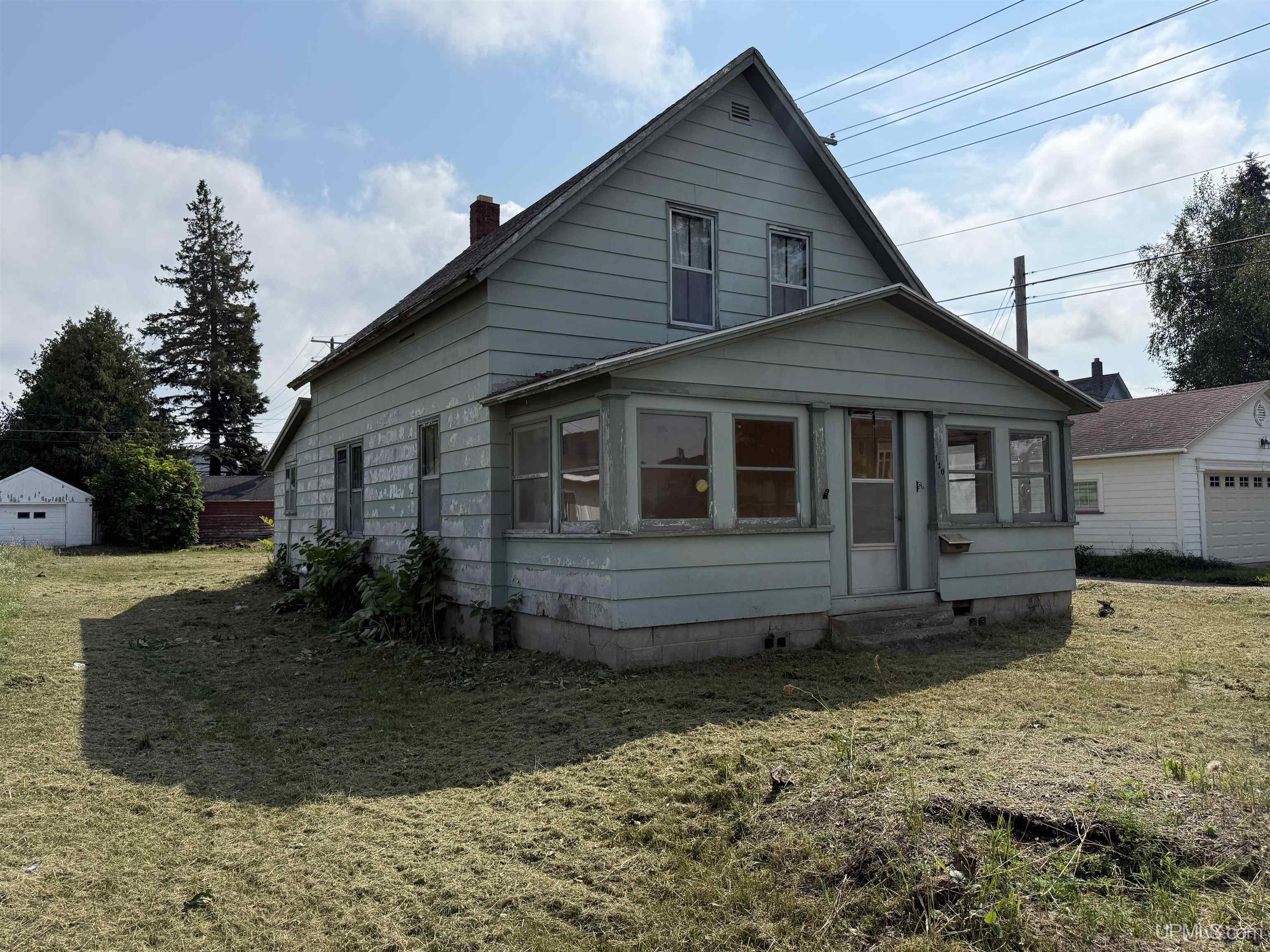 Photo 2 of Single family home for sale at 110 E Mcmillan Ave, Newberry, MI 49868 | MLS# 50221523 | Listing updated on 2026-09-12