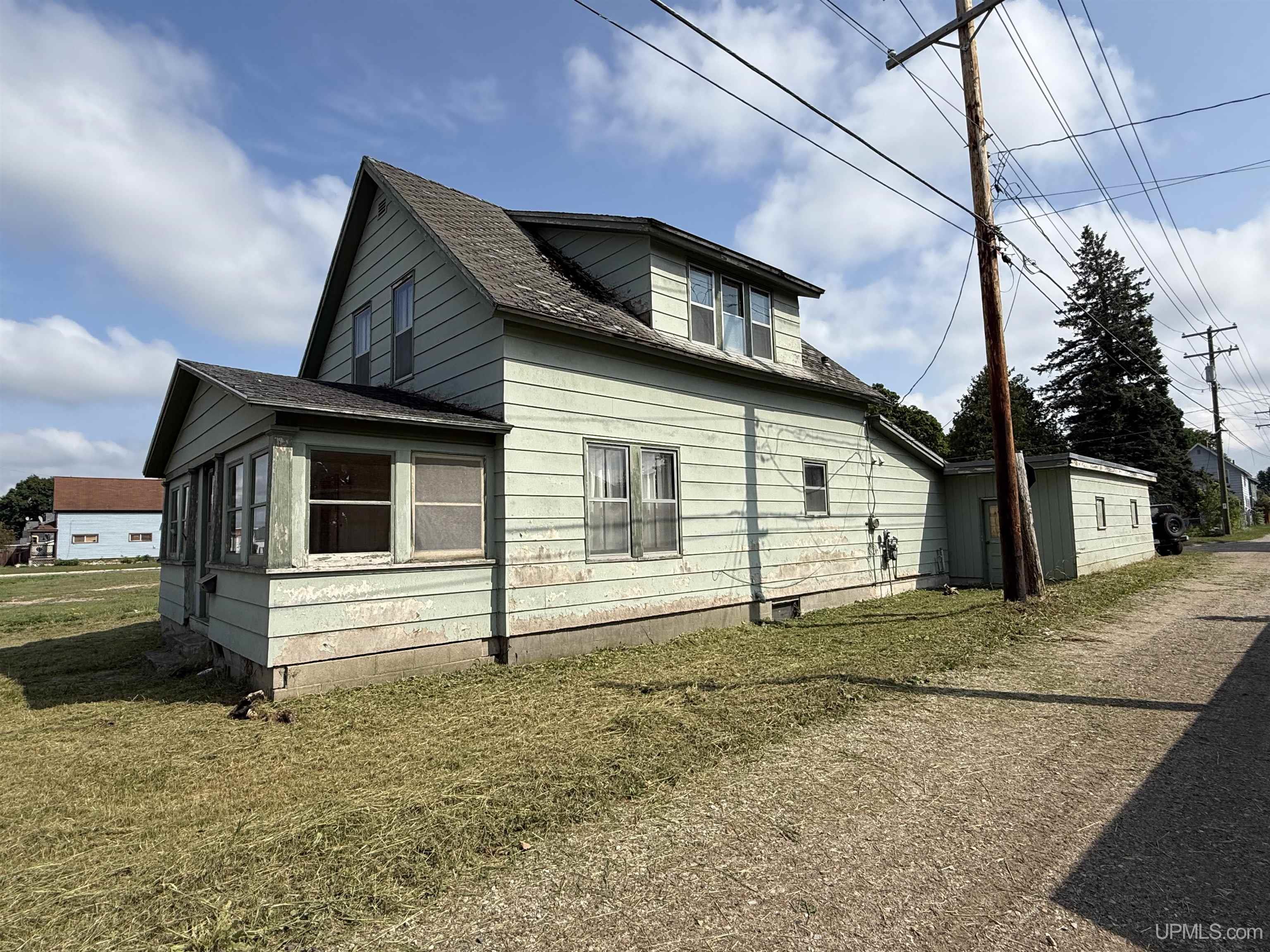 Photo 3 of Single family home for sale at 110 E Mcmillan Ave, Newberry, MI 49868 | MLS# 50221523 | Listing updated on 2026-09-12