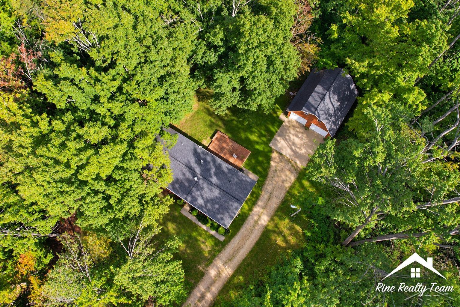 Photo 43 of Single family home for sale at 9378 Whispering Pines Dr, Mancelona, MI 49659 | MLS# 50221636 | Listing updated on 2026-09-13