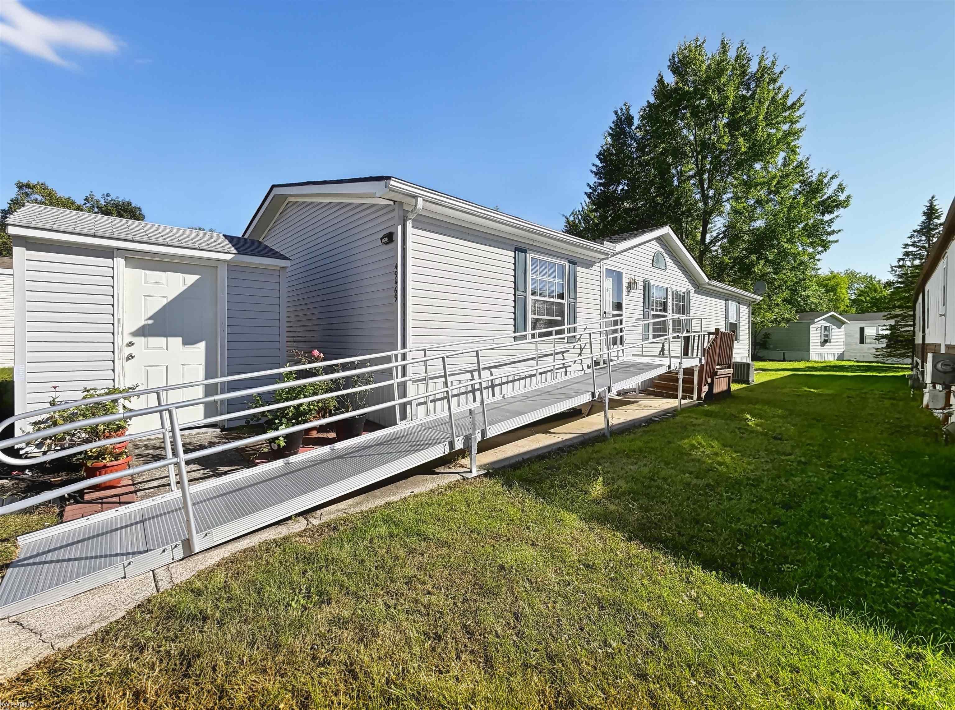Photo 2 of Single family home for sale at 49469 Au Lac Dr, Chesterfield, MI 48051 | MLS# 58050221637 | Listing updated on 2026-09-13