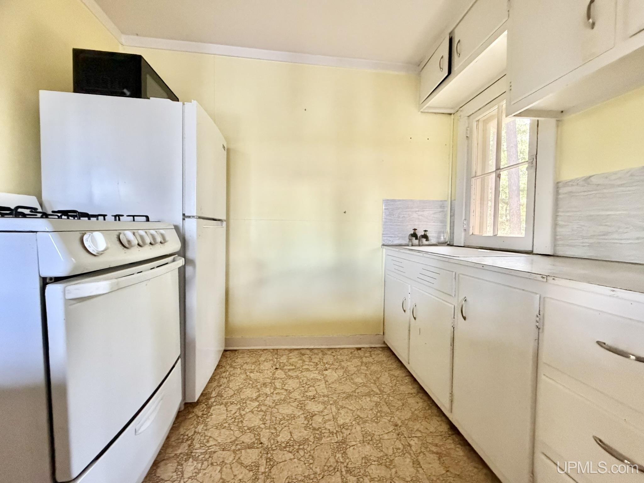 Photo 4 of Single family home for sale at 131 E Stager Lake Dr, Crystal Falls, MI 49920 | MLS# 50221764 | Listing updated on 2026-09-14