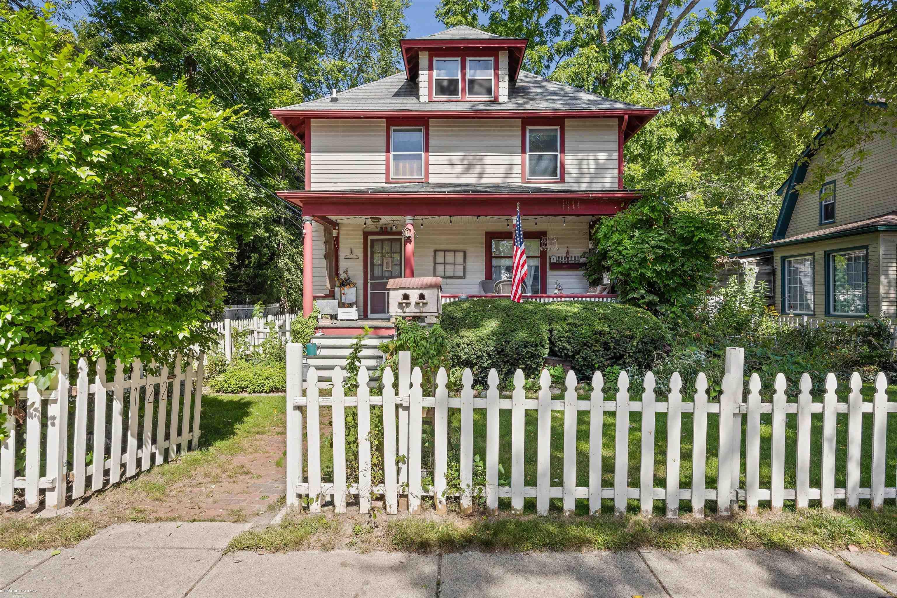 Don't miss this lovely historical home in the Village of Romeo. Original woodwork throughout. Many original light fixtures. Beautiful entry with craftsman style staircase to second floor. Deep front porch is perfect for sitting and enjoying life in the Village. First floor includes formal living, family room, dining room, library/den with window seat, full bath, kitchen with original "hoosier" style cabinetry and a breakfast room right off it. A addition in 2000 added a huge family room with a natural fireplace, plus a first floor laundry/mud room. Three bedrooms and a full bath with separate toilet room are on the second floor. The third floor attic is just waiting for someone to find it's perfect use. Fenced yard, side entry garage off no throughfare alley on side of property.