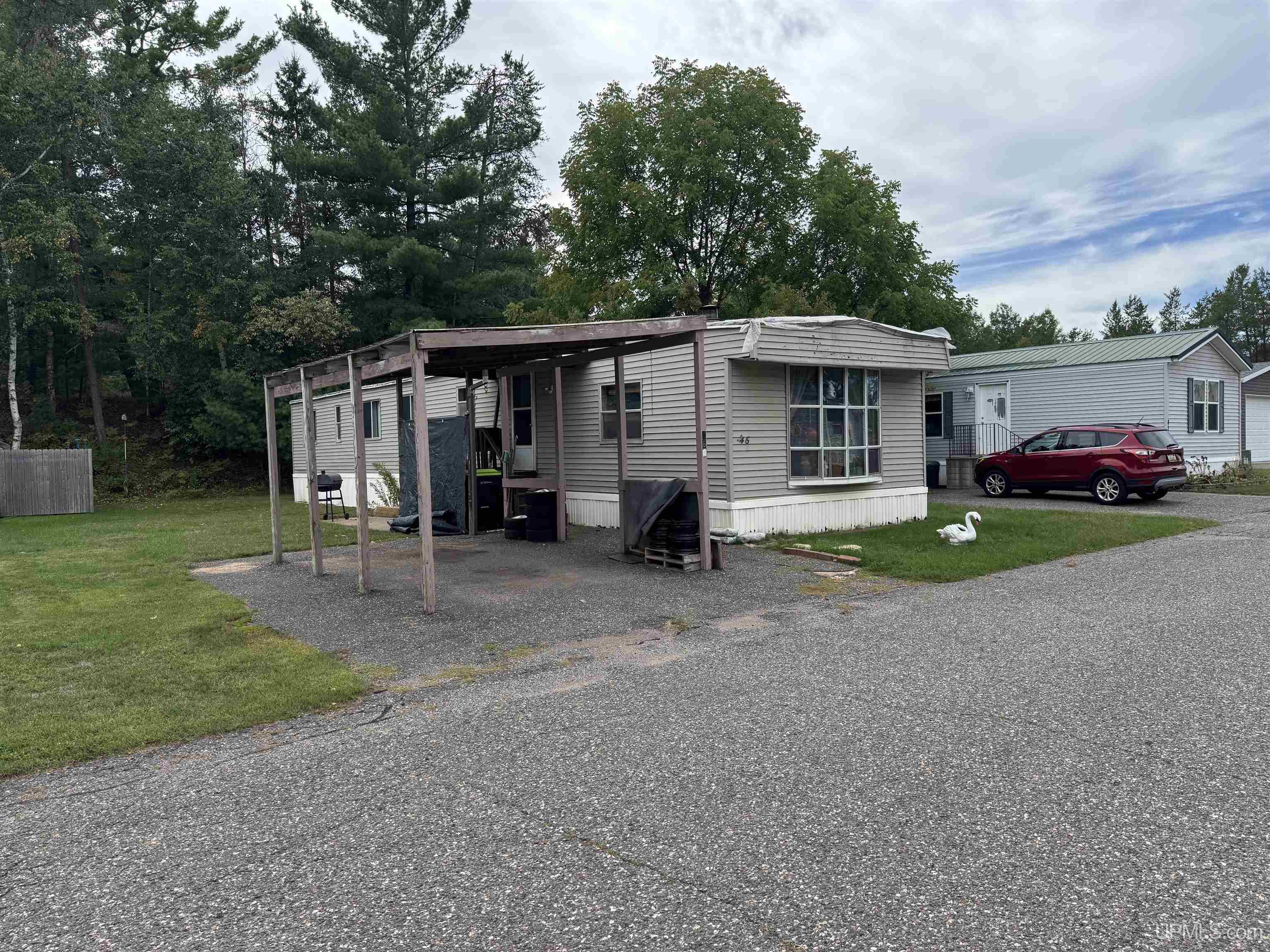 Photo 3 of Manufactured home for sale at N3905 Pine Mountain Rd, Iron Mountain, MI 49801 | MLS# 50221955 | Listing updated on 2026-09-16
