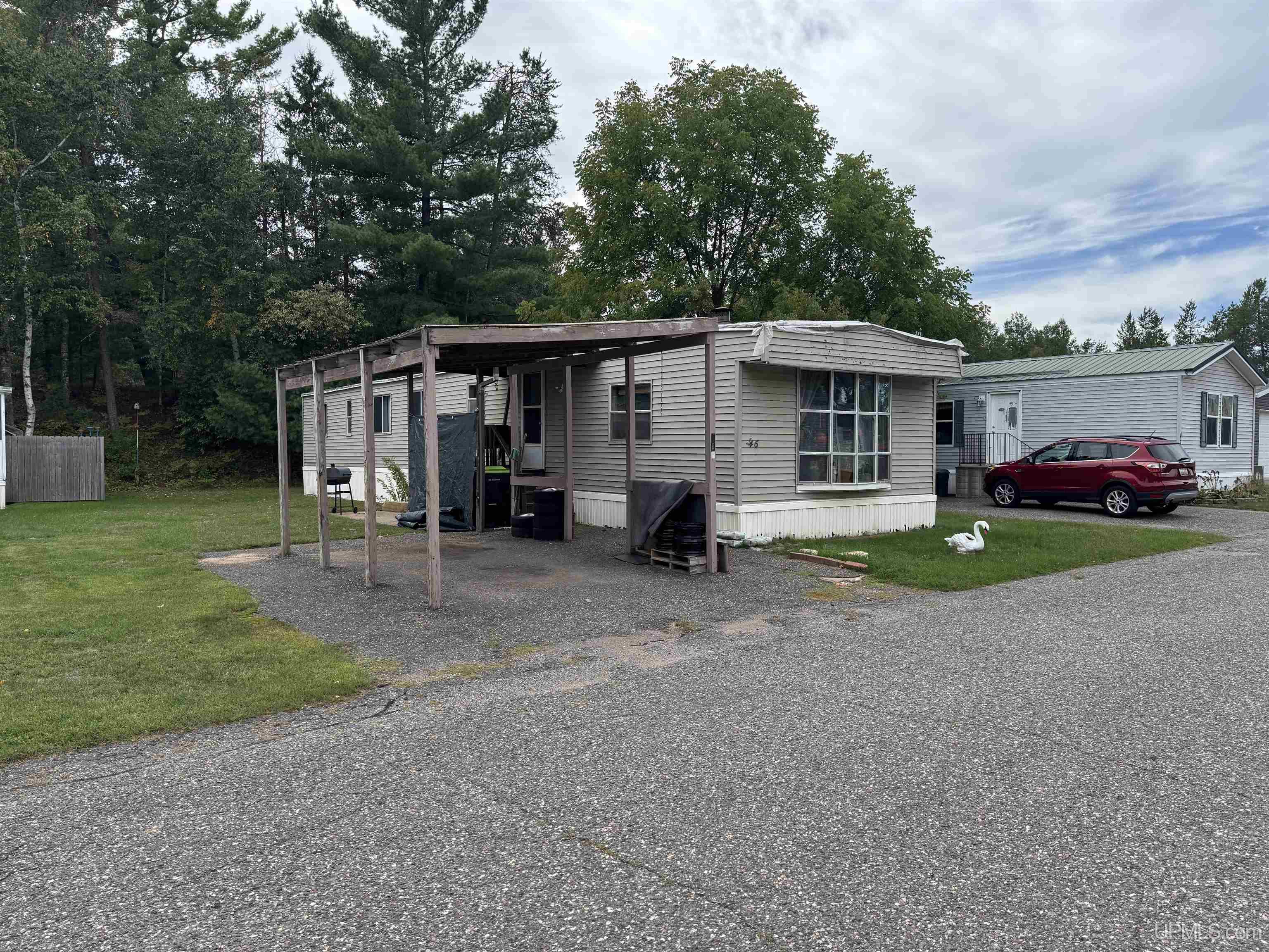 Photo 3 of Manufactured home for sale at N3905 Pine Mountain Rd, Iron Mountain, MI 49801 | MLS# 50221955 | Listing updated on 2026-09-16
