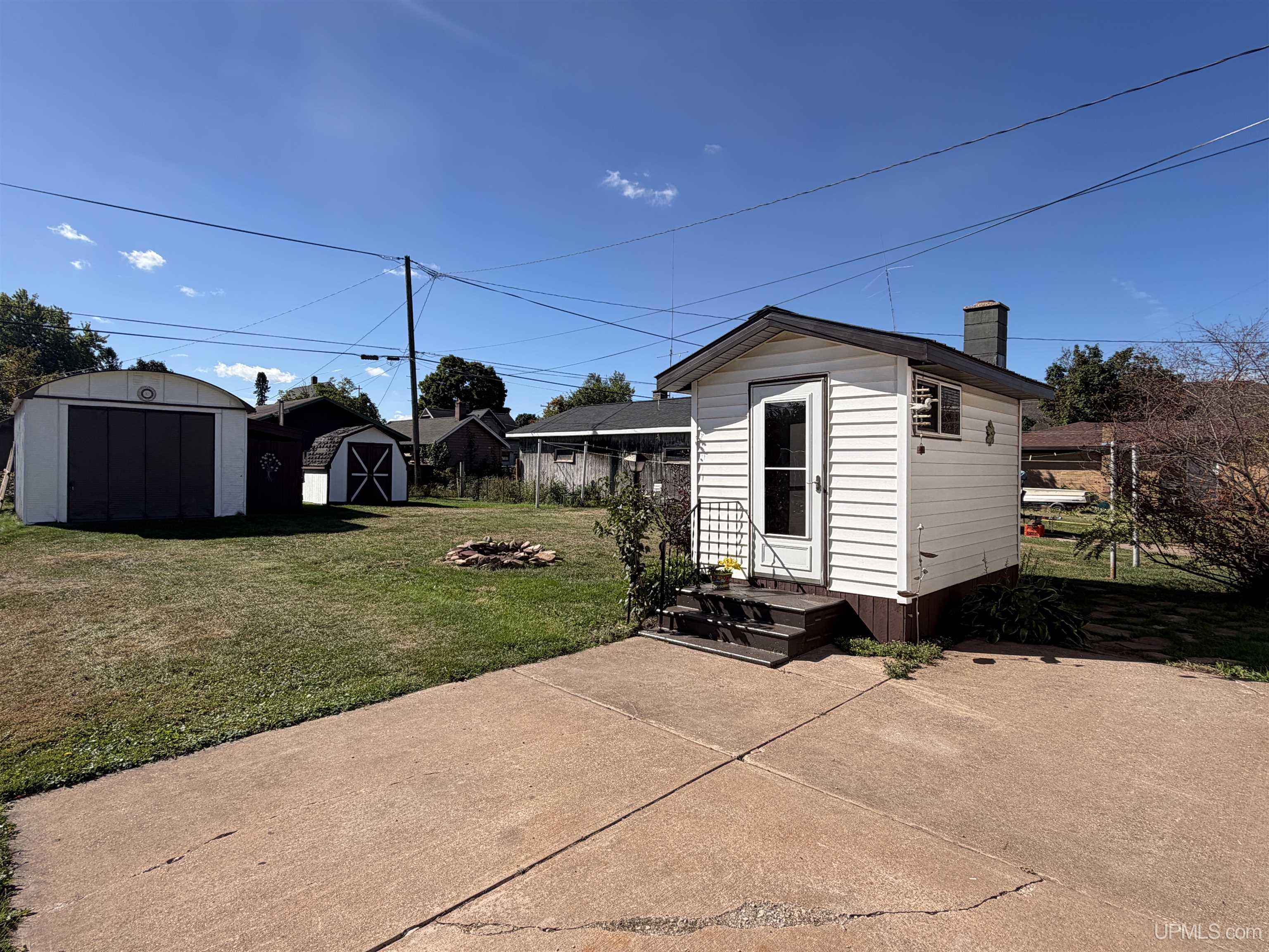 Photo 1 of Single family home for sale at 205 Kirkpatrick St, Palmer, MI 49871 | MLS# 50222171 | Listing updated on 2026-09-25