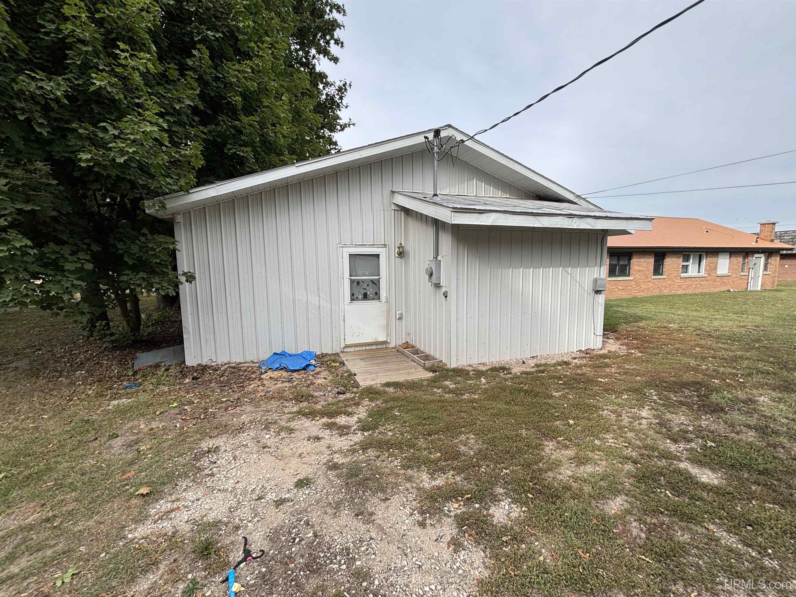 Photo 3 of Single family home for sale at 209 W John St, Newberry, MI 49868 | MLS# 50222449 | Listing updated on 2026-09-21