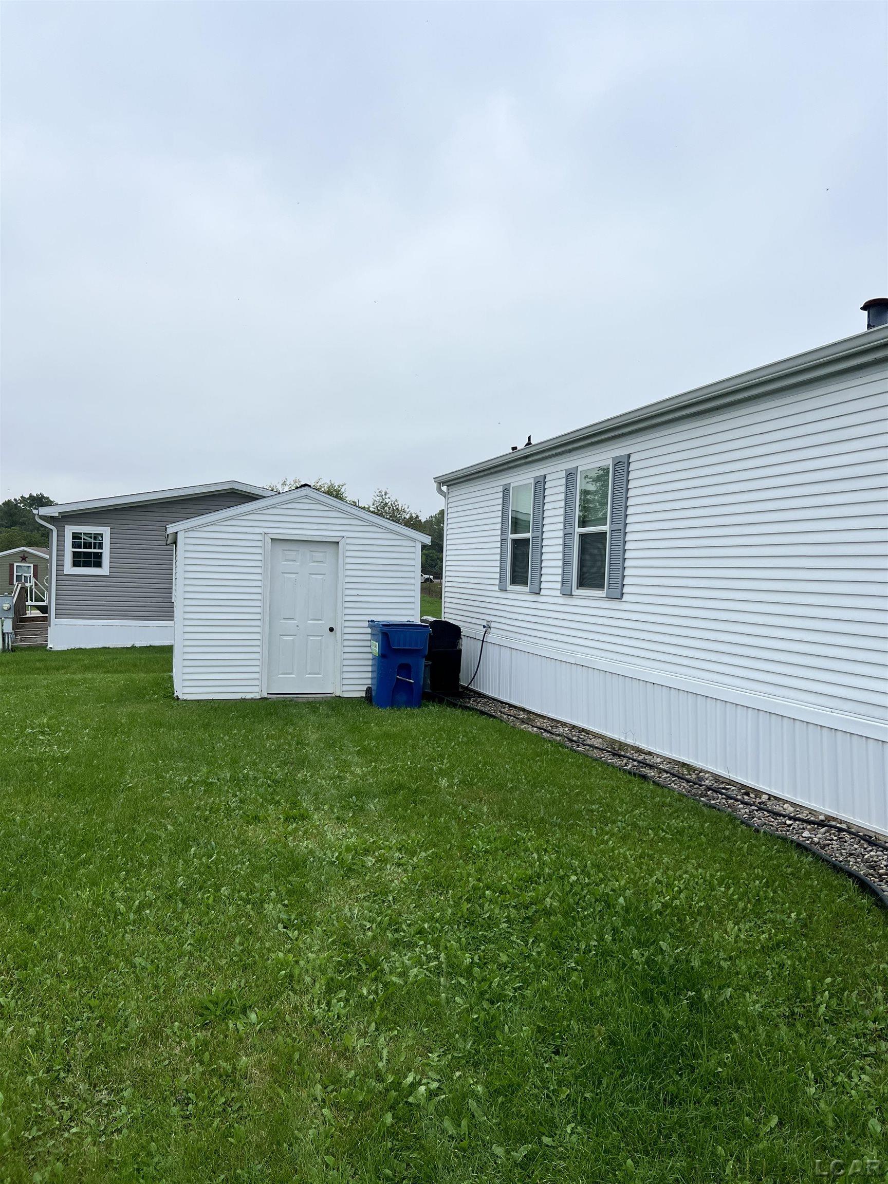 Photo 3 of Single family home for sale at 325 Grand River Dr, Adrian, MI 49221 | MLS# 56050222580 | Listing updated on 2026-09-22